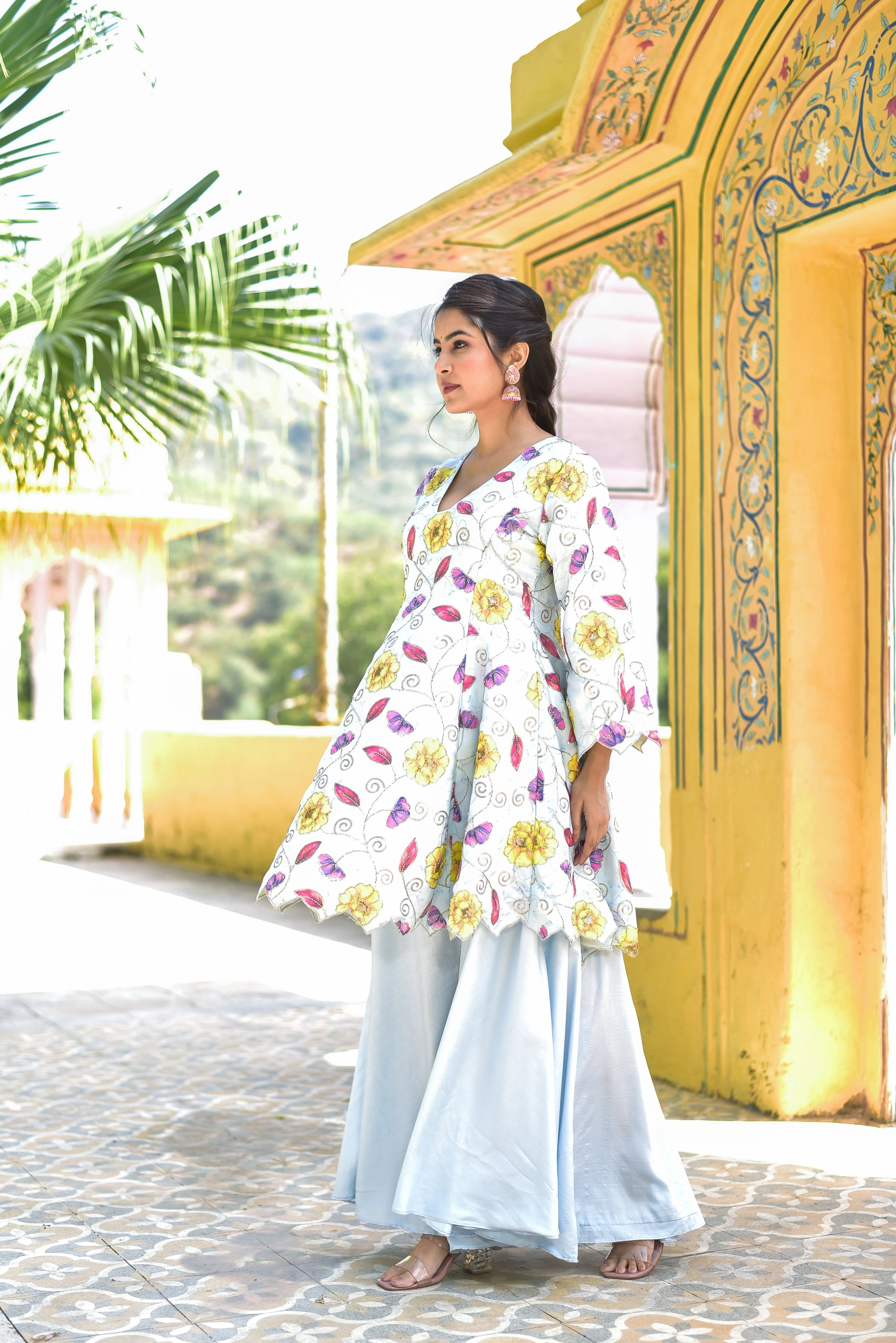 The Blue Morning Mist Floral Kurta Set is a captivating ensemble that embodies the essence of serenity and elegance. The soft blue and white hues evoke the gentle mist of a morning garden, while the intricate floral pattern adds a touch of whimsy and charm. The kurta's flowing silhouette and delicate embroidery create a sense of ethereal beauty, making it perfect for special occasions or everyday wear.