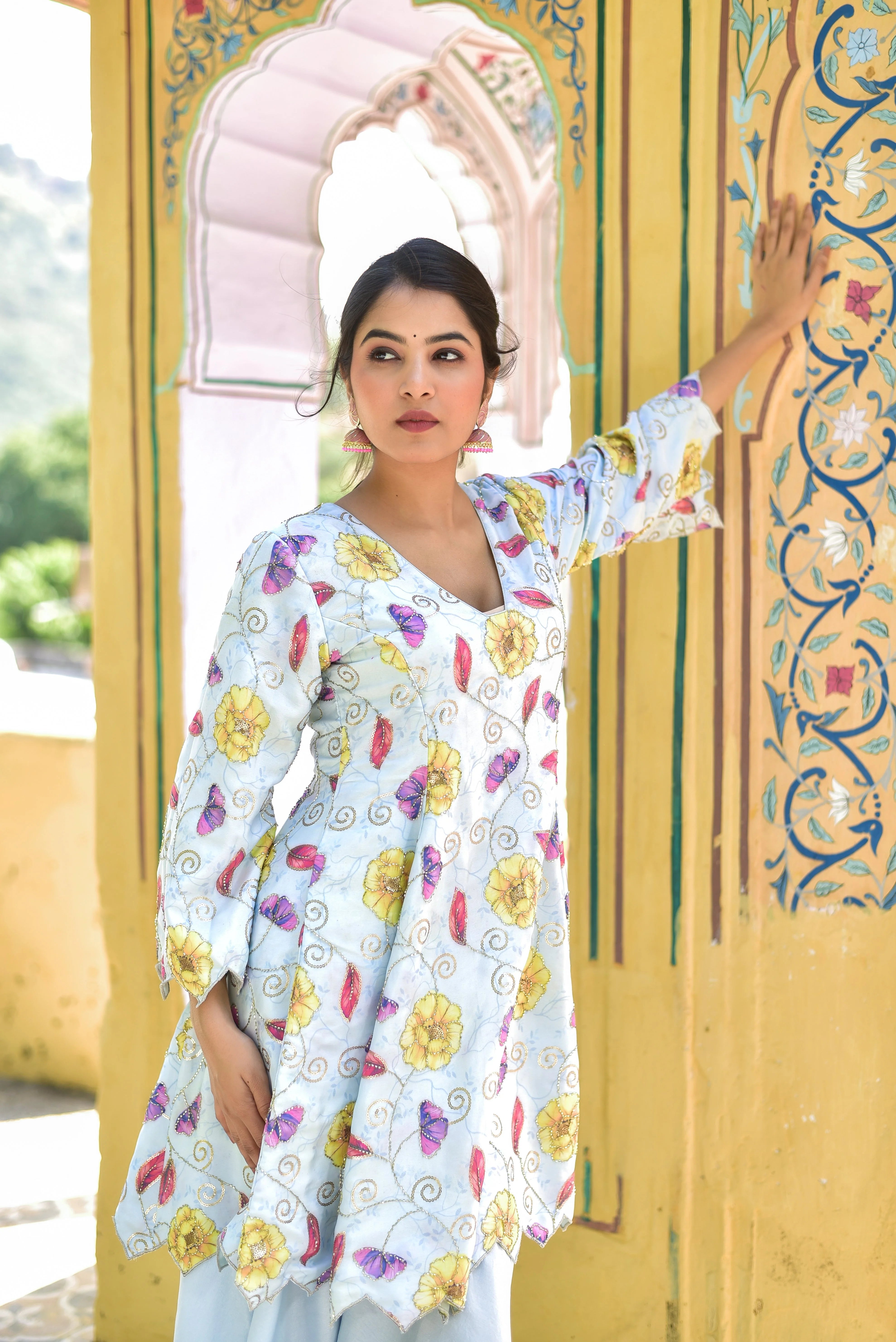 The Blue Morning Mist Floral Kurta Set: A Serene and Elegant Ensemble
This enchanting kurta set features a soft blue and white hue, adorned with intricate floral embroidery that captures the essence of a misty morning garden. The delicate blooms are woven together with elegant threads, creating a timeless and sophisticated look.