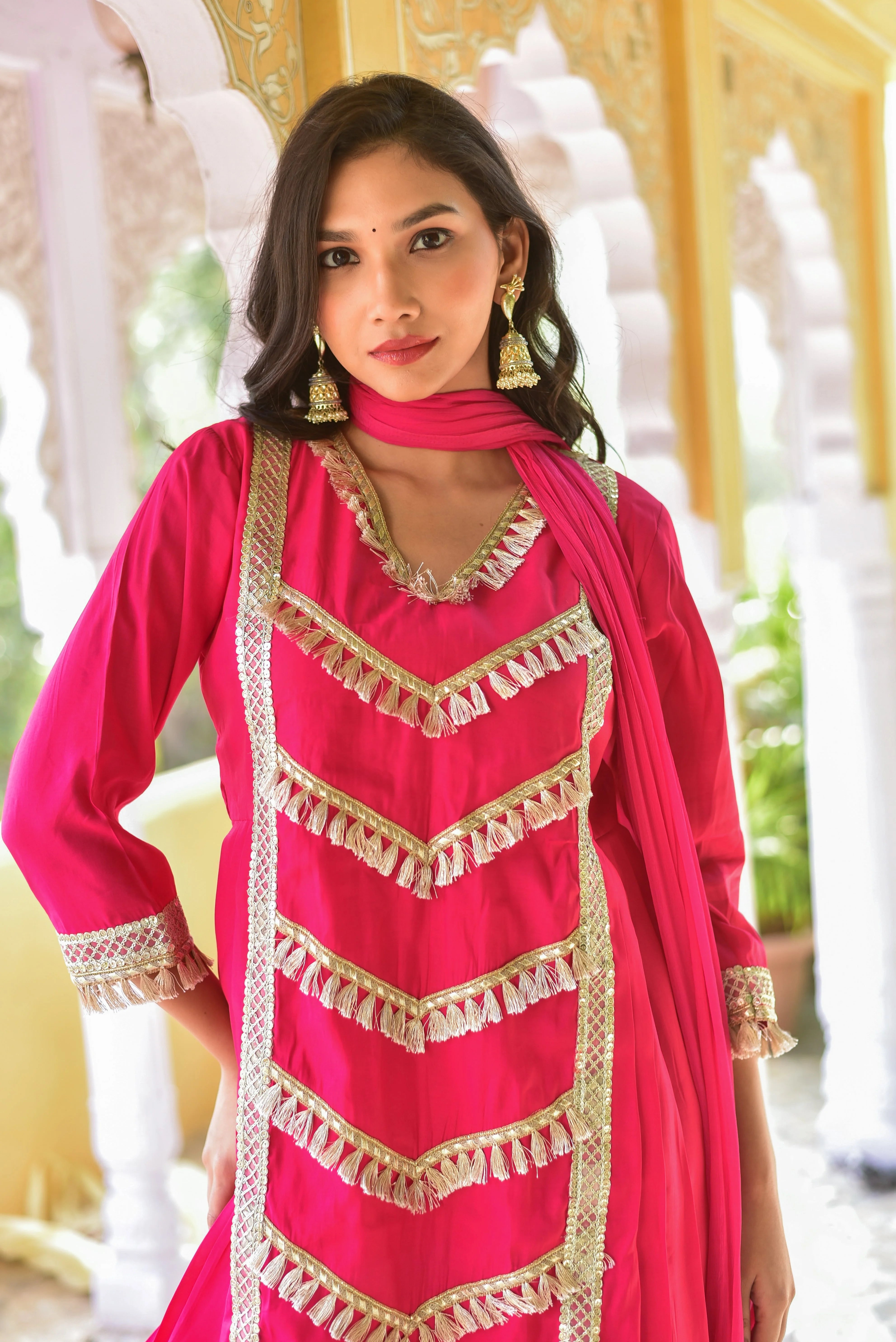 Elevate Your Style with this Peony Pink Kurta & Pant Set
This exquisite Peony Pink Kurta & Pant Set is a testament to timeless elegance, crafted with meticulous attention to detail. The vibrant peony pink hue is accentuated by intricate gold embroidery and tassel detailing, creating a striking visual effect.
Fabric and Fit
The set features a luxurious blend of fabrics, including silk, cotton, and polyester, ensuring both comfort and durability.