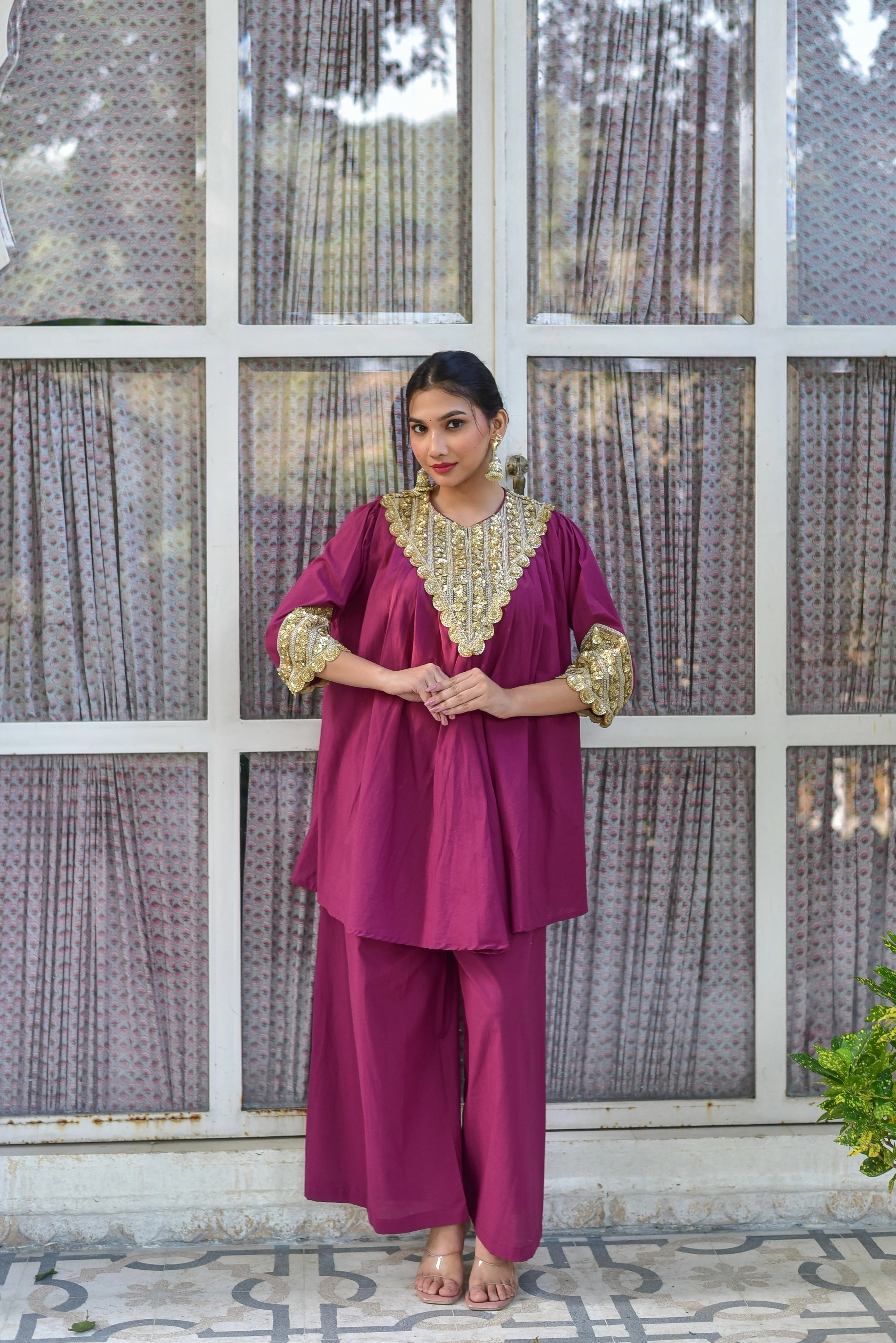 The Mulberry Gold Glaze Co-Ord Set is a stunning ensemble that combines contemporary silhouettes with timeless craftsmanship. Crafted from 100% pure cotton, this luxurious set drapes beautifully while ensuring all-day comfort and breathability. The rich mulberry color and intricate gold glaze details add a touch of sophistication, making it perfect for any occasion. With its elegant design and comfortable fit, this co-ord set is a must-have for anyone looking to elevate their wardrobe.