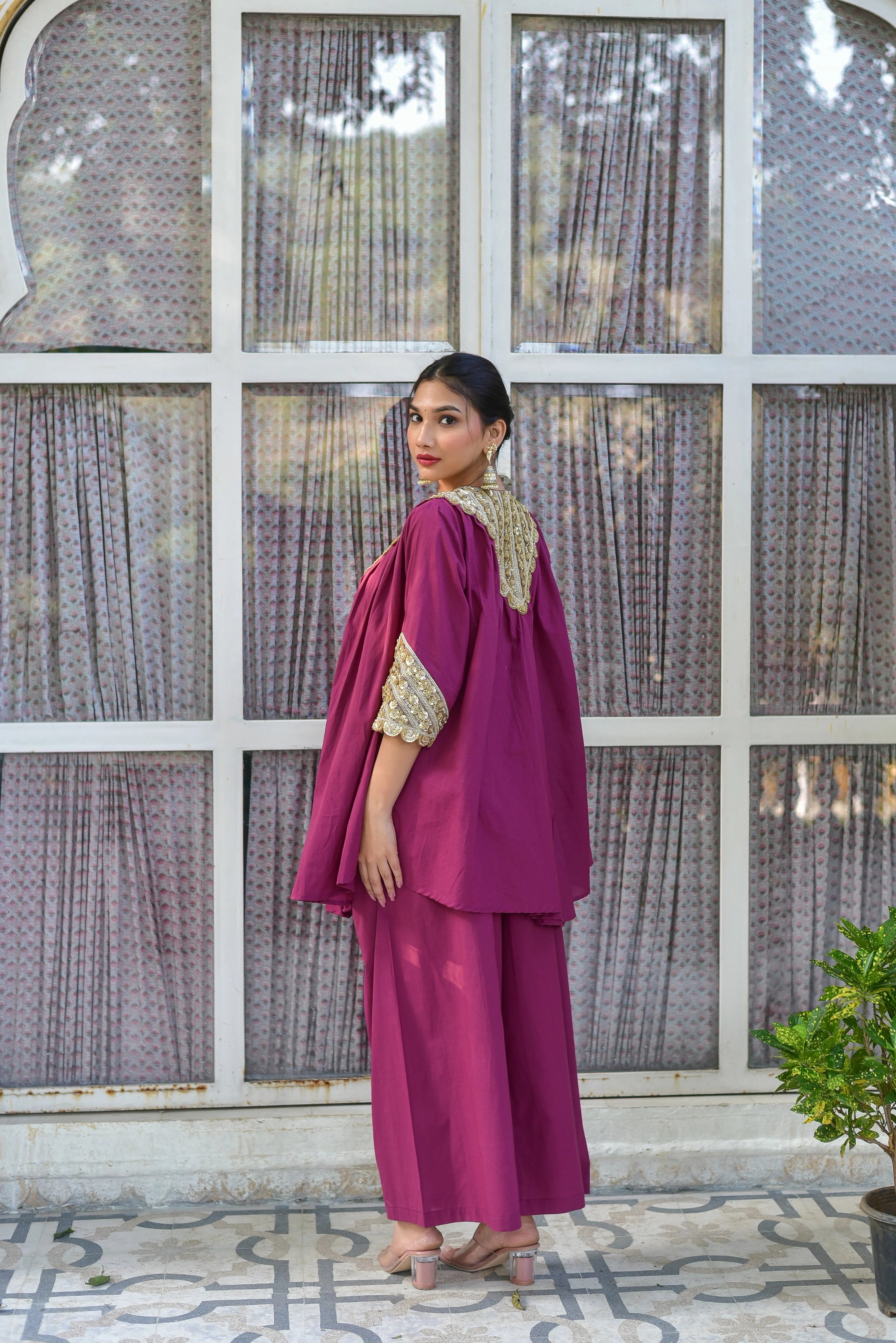 The Mulberry Gold Glaze Co-Ord Set is a stunning ensemble that exudes elegance and sophistication. Crafted from 100% pure cotton, this luxurious set drapes beautifully, ensuring all-day comfort and breathability. The intricate gold glaze embroidery adds a touch of luxury, making this set perfect for special occasions or everyday wear. With its contemporary silhouette and timeless design, this co-ord set is a must-have for anyone looking to elevate their wardrobe.