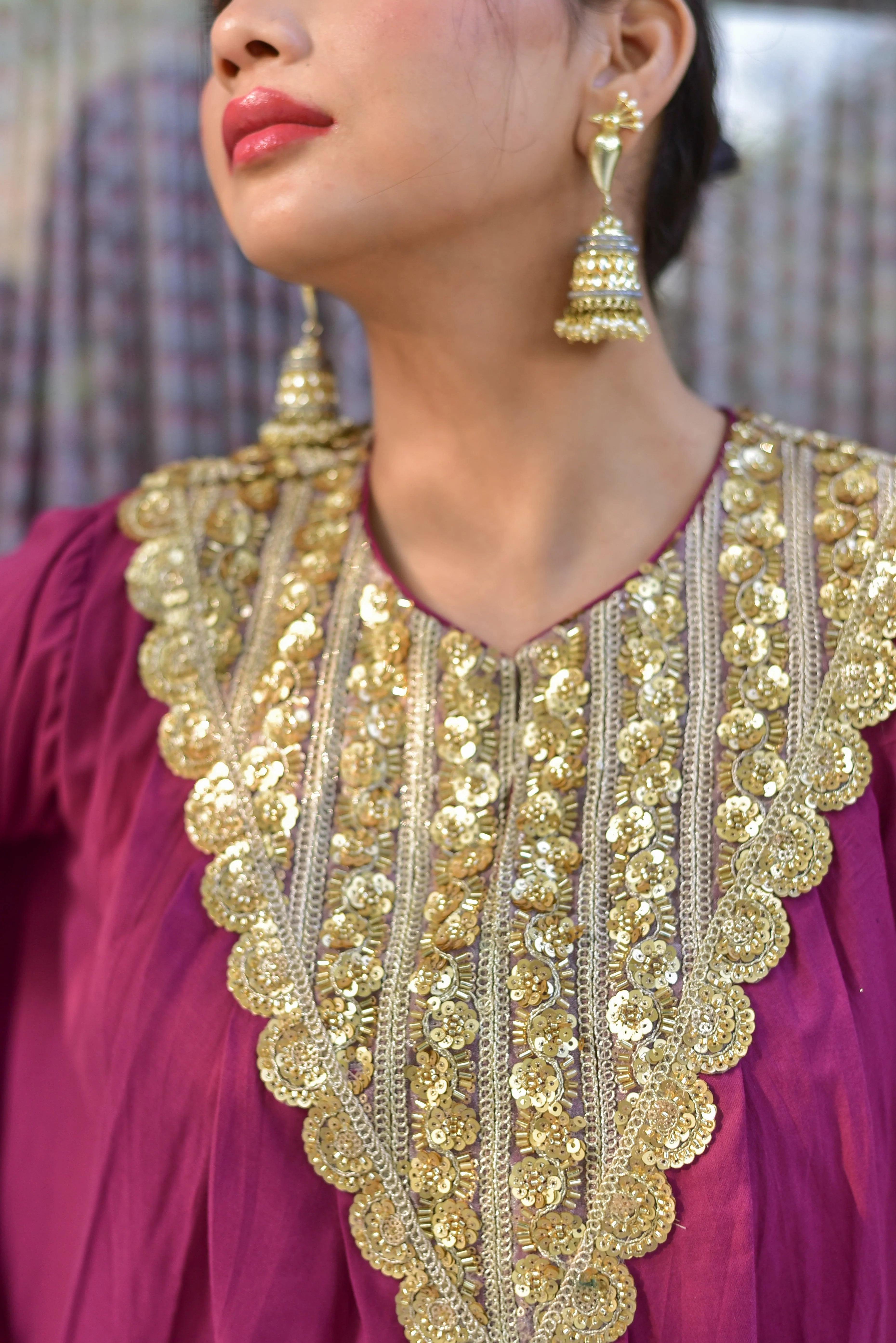 The Mulberry Gold Glaze Co-Ord Set is a stunning ensemble that combines contemporary silhouettes with timeless craftsmanship. Crafted from 100% pure cotton, this luxurious set drapes beautifully while ensuring all-day comfort and breathability. The rich mulberry color and gold glaze accents create an elegant and sophisticated look, perfect for making a statement at any occasion.