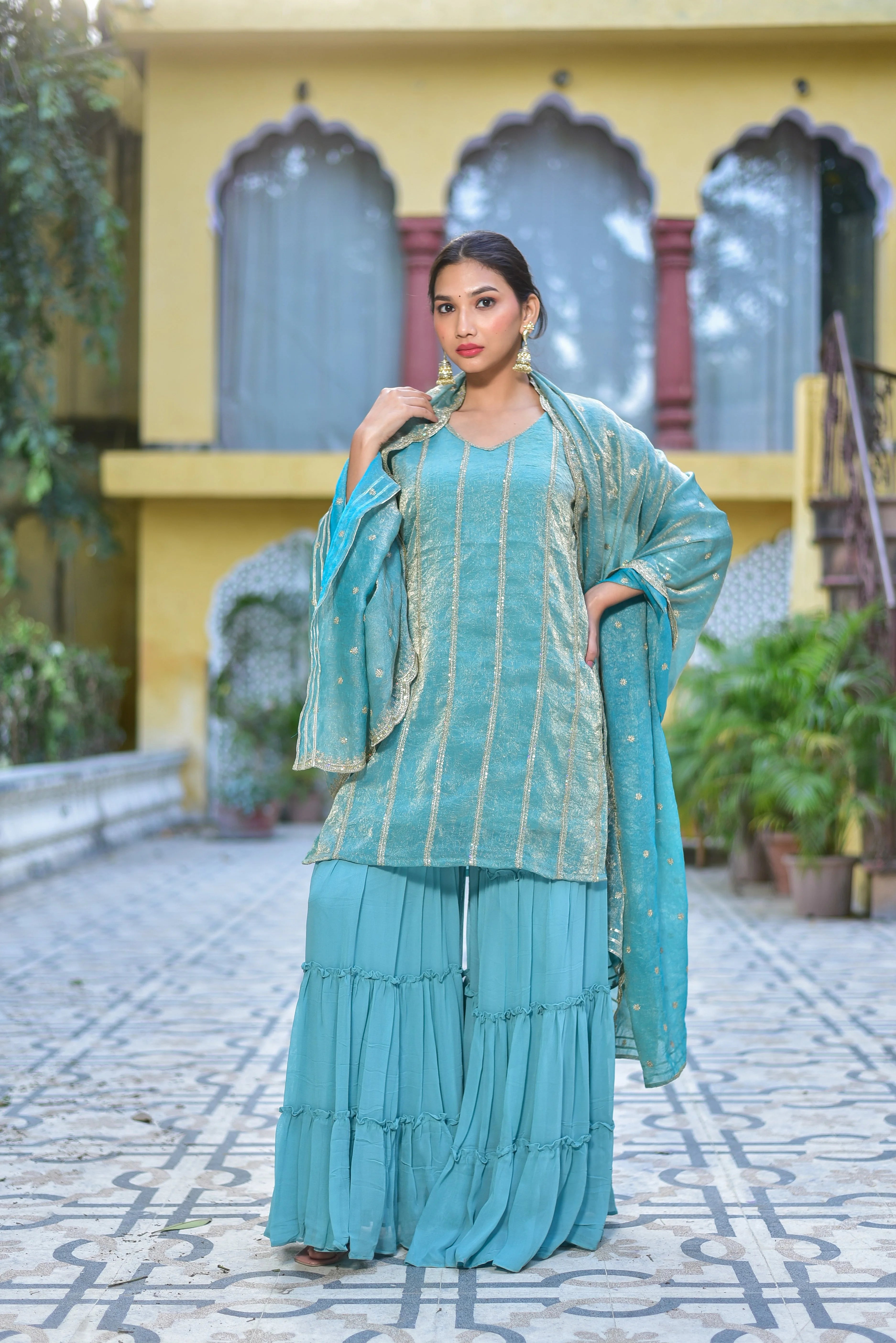 The Sea Green Kurta Sharara Set is a stunning ensemble that exudes elegance and sophistication. The sea green hue of the outfit is a soothing and calming color that evokes feelings of serenity and tranquility. The kurta is made from a lightweight, breathable fabric that drapes elegantly on the body, creating a fluid silhouette that is both comfortable and stylish.
The sharara pants are a beautiful addition to the outfit, adding a touch of whimsy and playfulness to the overall look.