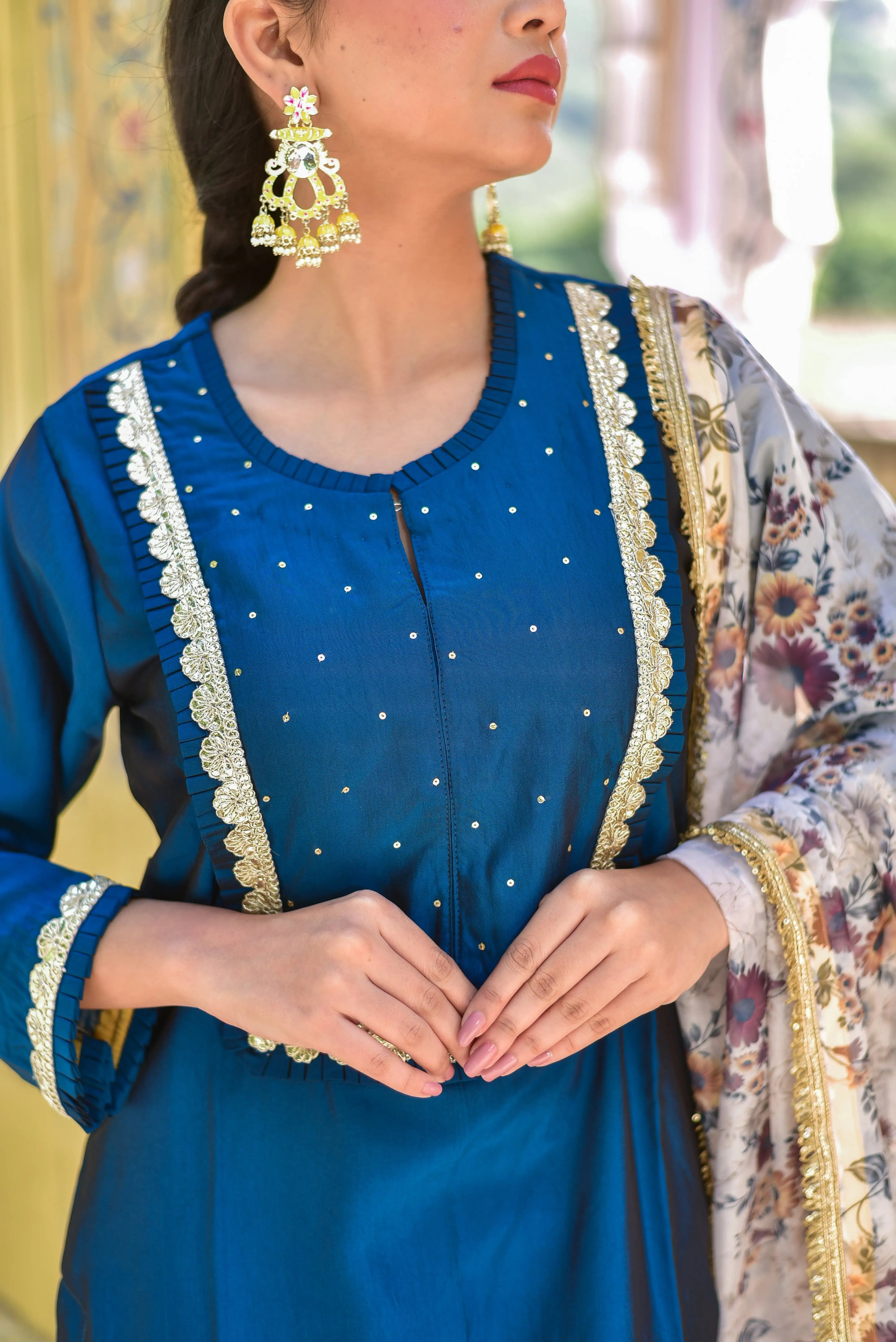 Elevate Your Style with Elegance
This stunning Peacock Blue Kurta & Pant Set is a masterpiece of traditional Indian heritage, exuding regal sophistication and timeless beauty. The rich peacock blue hue is accentuated by intricate details that add a touch of refinement to the ensemble.
Key Features:
Elegant Kurta: Crafted with precision, the kurta boasts a classic design that flatters any body type.