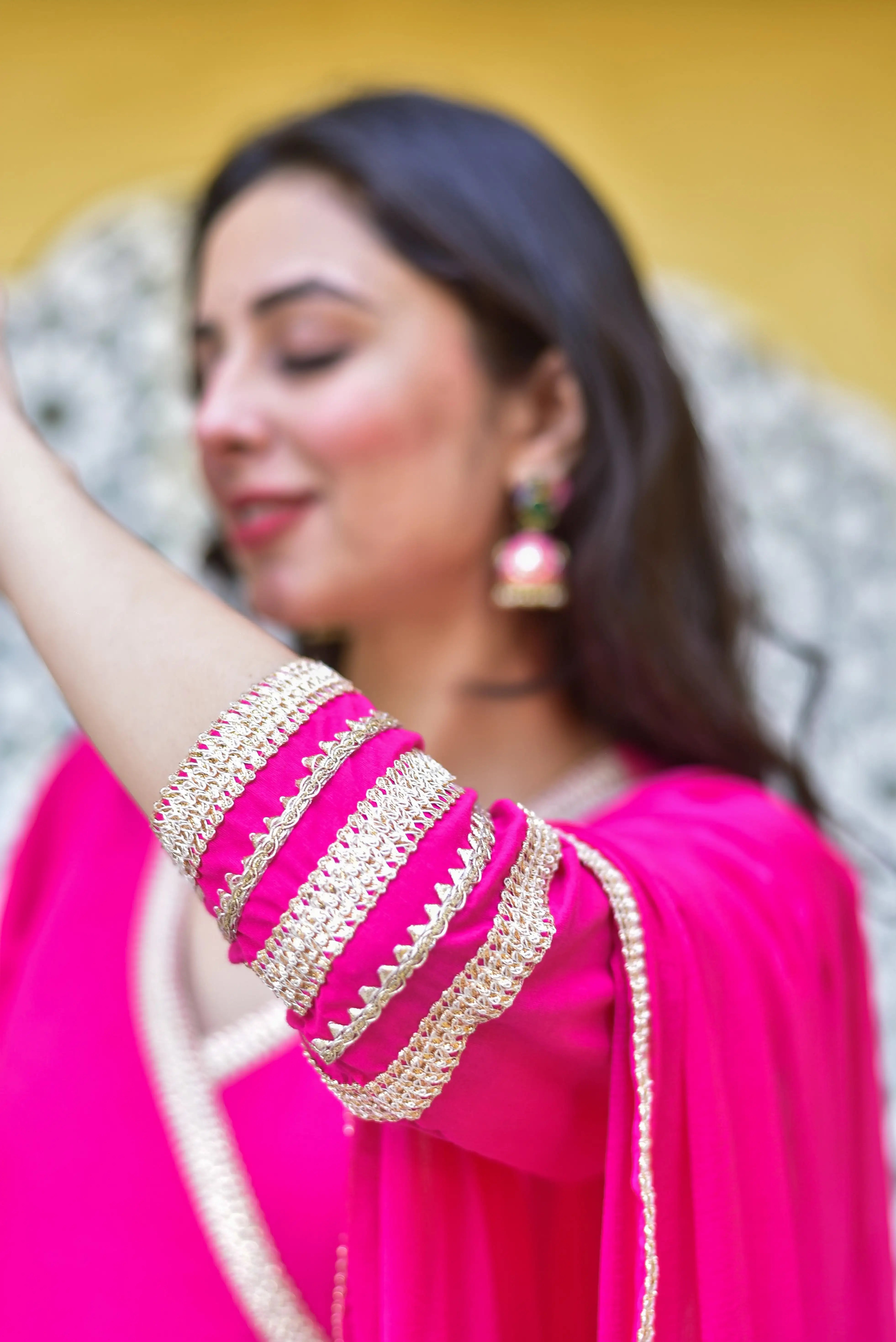 This rani pink anarkali set is a stunning example of traditional Indian elegance, exuding joy and celebration with its vibrant fuchsia hue. The rich, bold color is a timeless favorite for festive occasions, bringing energy and sophistication to every gathering. Crafted from luxurious fabric, this ensemble is designed to make a statement, perfect for those seeking a truly elegant and eye-catching look.