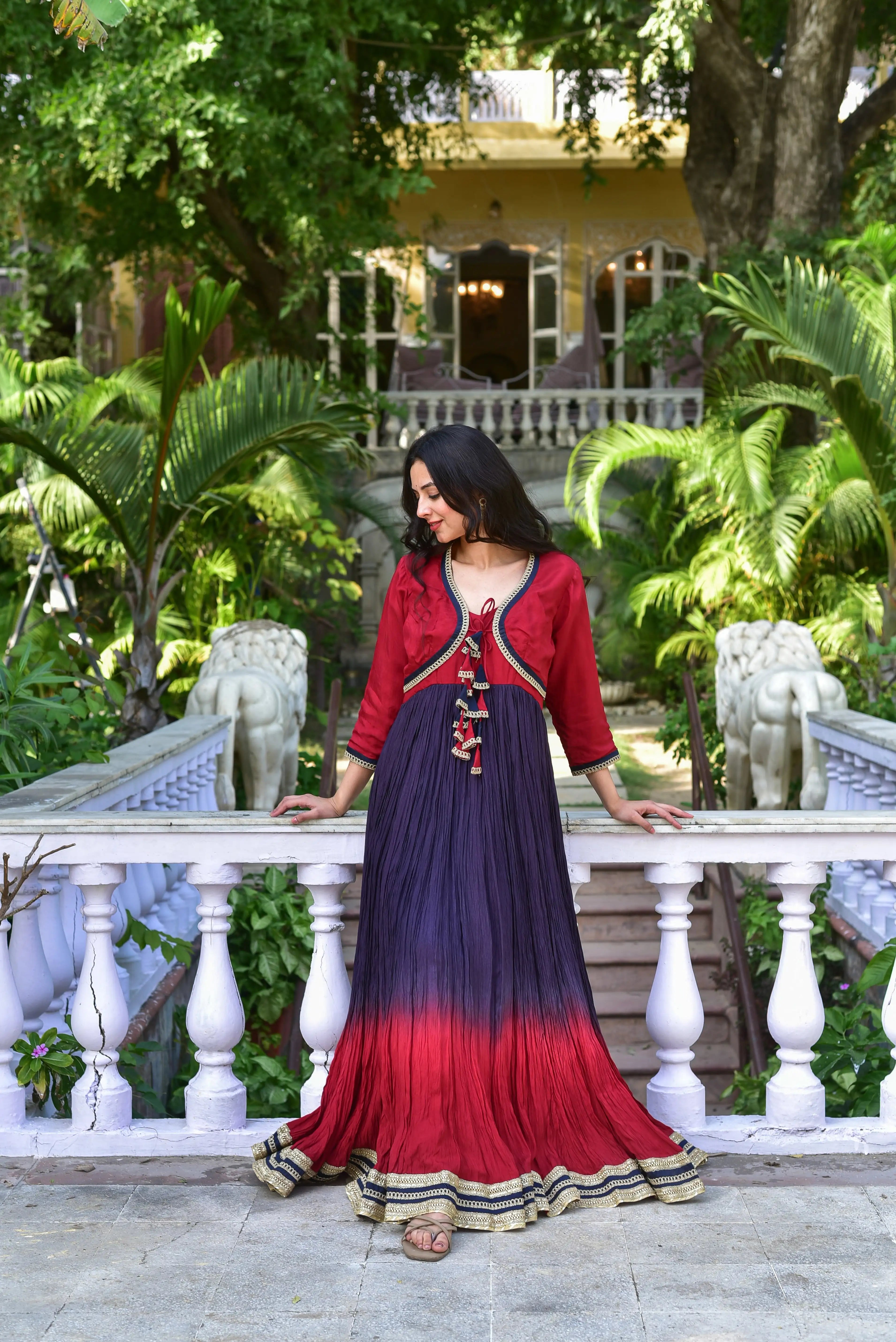 The Twilight Ombre Gown With Jacket is a stunning ensemble that combines the elegance of silk fabric with the mesmerizing effect of ombre dyeing. The luxurious silk fabric features a breathtaking color transition, gradating from one hue to another in a smooth, seamless manner. The ombre effect creates a sense of depth and dimensionality, adding visual interest to the overall design.
The gown's style is characterized by its flowing silhouette, with a floor-length skirt that drapes elegantly around the legs.