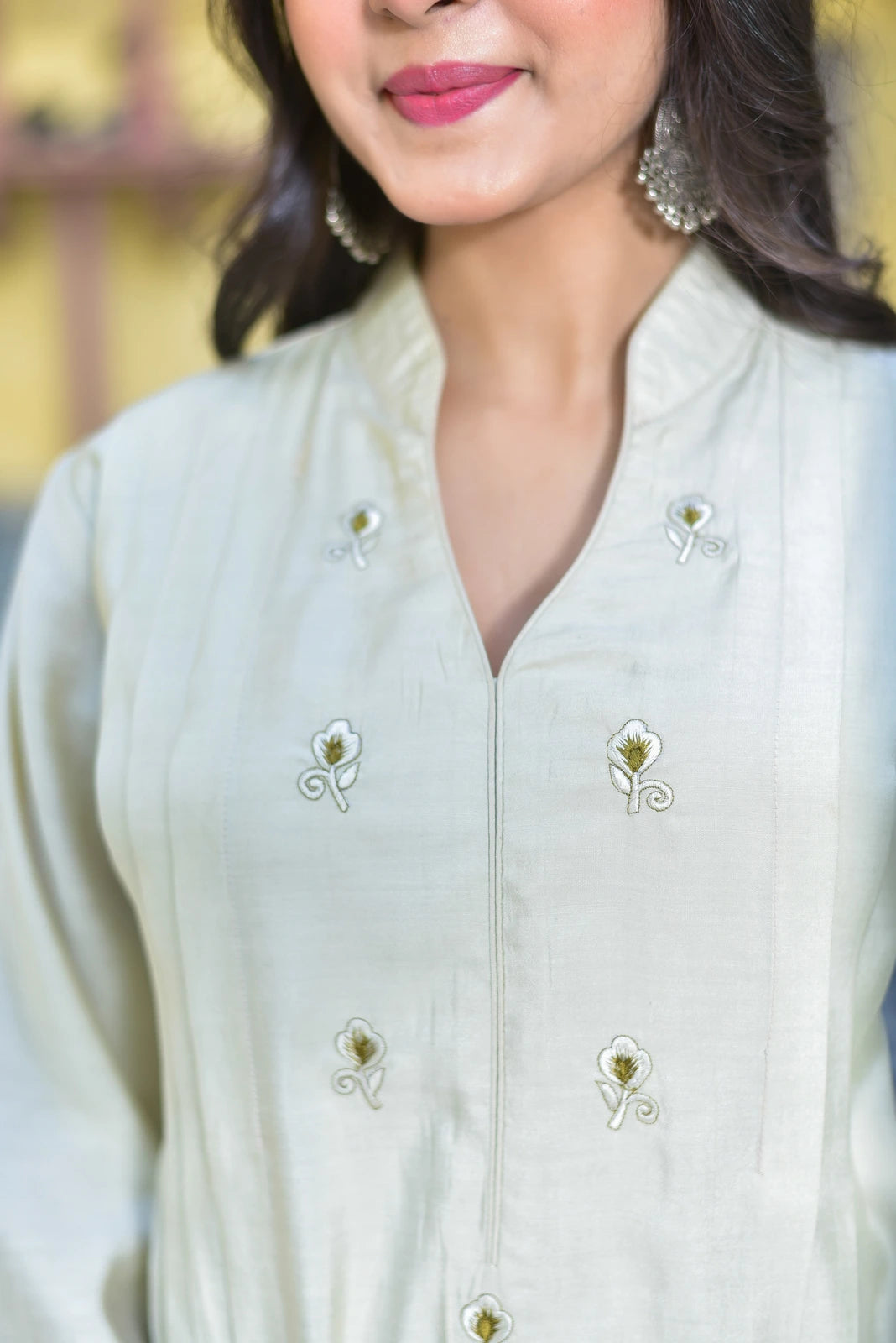 The Creamy Kaju Katli Pleated Kurta Set is a stunning 2-piece ensemble that exudes elegance and sophistication. The set features a creamy white kurta with intricate pleating details, adorned with beautiful floral embroidery that adds a touch of femininity and charm. The kurta is crafted from luxurious fabric, ensuring a comfortable and smooth fit. The set is completed with a matching bottom, creating a cohesive and stylish look.