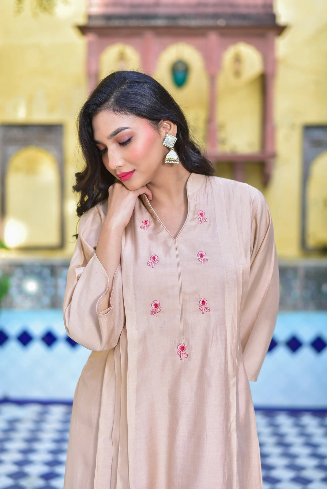 The Creamy Kaju Katli Pleated Kurta Set is a stunning 2-piece ensemble that exudes luxurious elegance. This exquisite outfit features a pleated design, adding a touch of sophistication to its overall aesthetic. The creamy color of the kurta is reminiscent of the rich, velvety texture of kaju katli, a traditional Indian sweet, and the pleats add a playful yet refined touch to the garment.
The set includes a kurta and a matching bottom, both crafted from high-quality fabric that drapes elegantly on the body.