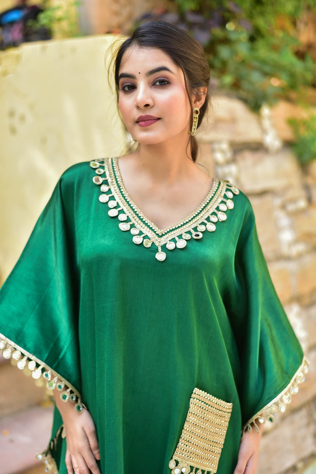 Elegant and Sophisticated Forest Green Kaftan Set
The Forest Glaze Mirror Work Set is a stunning ensemble that exudes elegance and sophistication. Crafted from luxurious Gazzi Satin, this kaftan set features intricate mirror work detailing that adds a touch of glamour to the overall design.
Key Features:
Gazzi Satin Fabric: The kaftan is made from high-quality Gazzi Satin, which provides a smooth and lustrous texture.