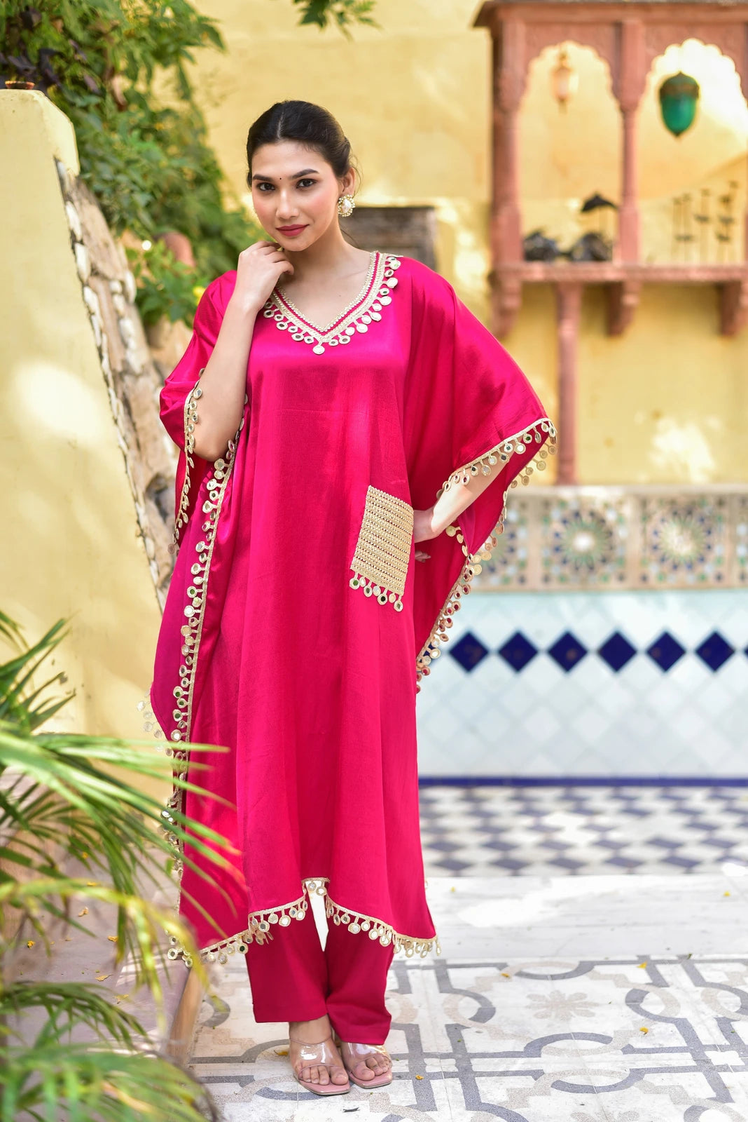 "Step into the enchanting world of Forest Glaze with this stunning Mirror Work Set. Crafted in luxurious Gazzi Satin, the kaftan exudes regal elegance, while the intricate mirror work adds a touch of contemporary flair. Perfect for making a statement, this set is a must-have for those seeking both style and sophistication."