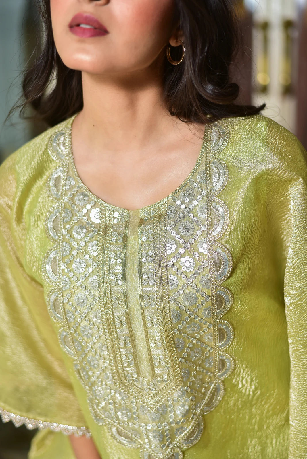 This stunning pastel green kaftan dress is a masterpiece of elegance and sophistication, crafted from premium moss organza that drapes beautifully while maintaining its graceful structure. The sophisticated lavender tone exudes regal charm, making this piece a statement for your special occasions. The intricate embroidery and luxurious fabric create a truly eye-catching look that is sure to turn heads.