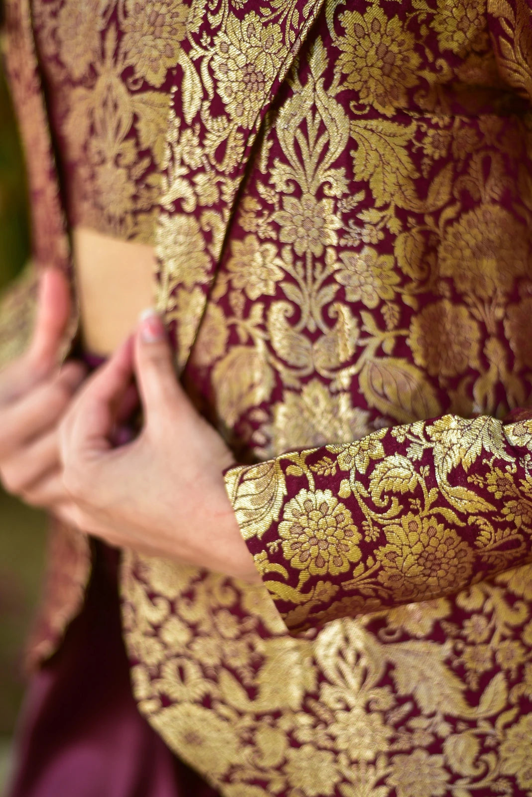 The Plum Magic Brocade 3 Piece Set is a stunning ensemble that exudes elegance and sophistication. The set consists of a beautifully crafted brocade blazer, a matching plum-colored top, and a flowing skirt, all made from luxurious gold brocade fabric. The blazer features intricate embroidery on the front and sleeves, adding an extra layer of refinement to the overall design.
This exquisite set is perfect for making a statement at any formal occasion, from weddings to red-carpet events.