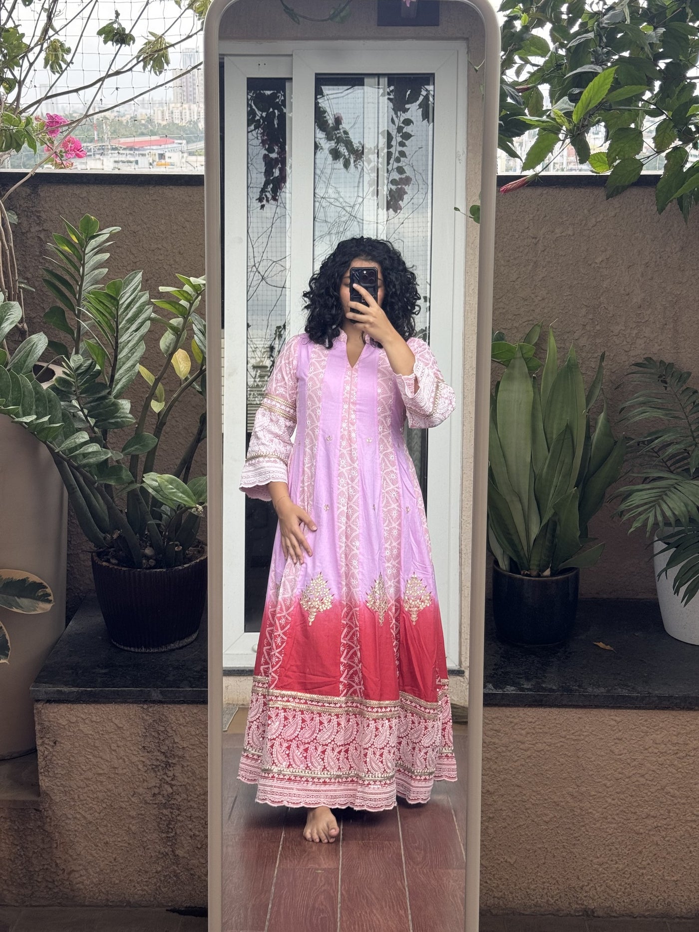 Saroj Jain Ombre Lavender Pink and Crimson Red Lucknowi Chikankari Anarkali Gown full silhouette with Gota Patti hem.