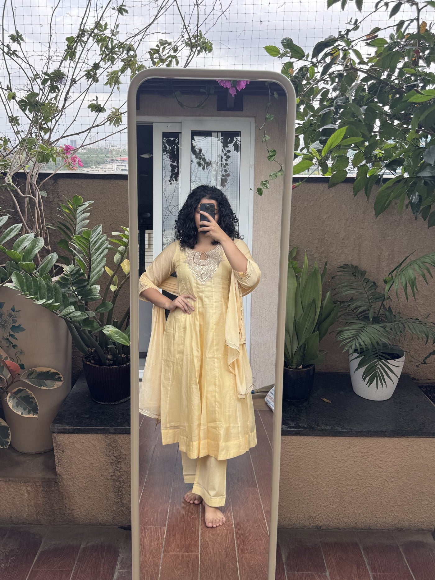 Saroj Jain Pastel Sunshine Yellow Lucknowi Chikankari Anarkali Gown full length silhouette with flared gathers and matching pants.