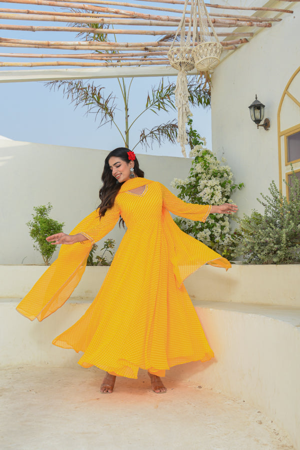 Pastel kurta set styled with gold jewelry