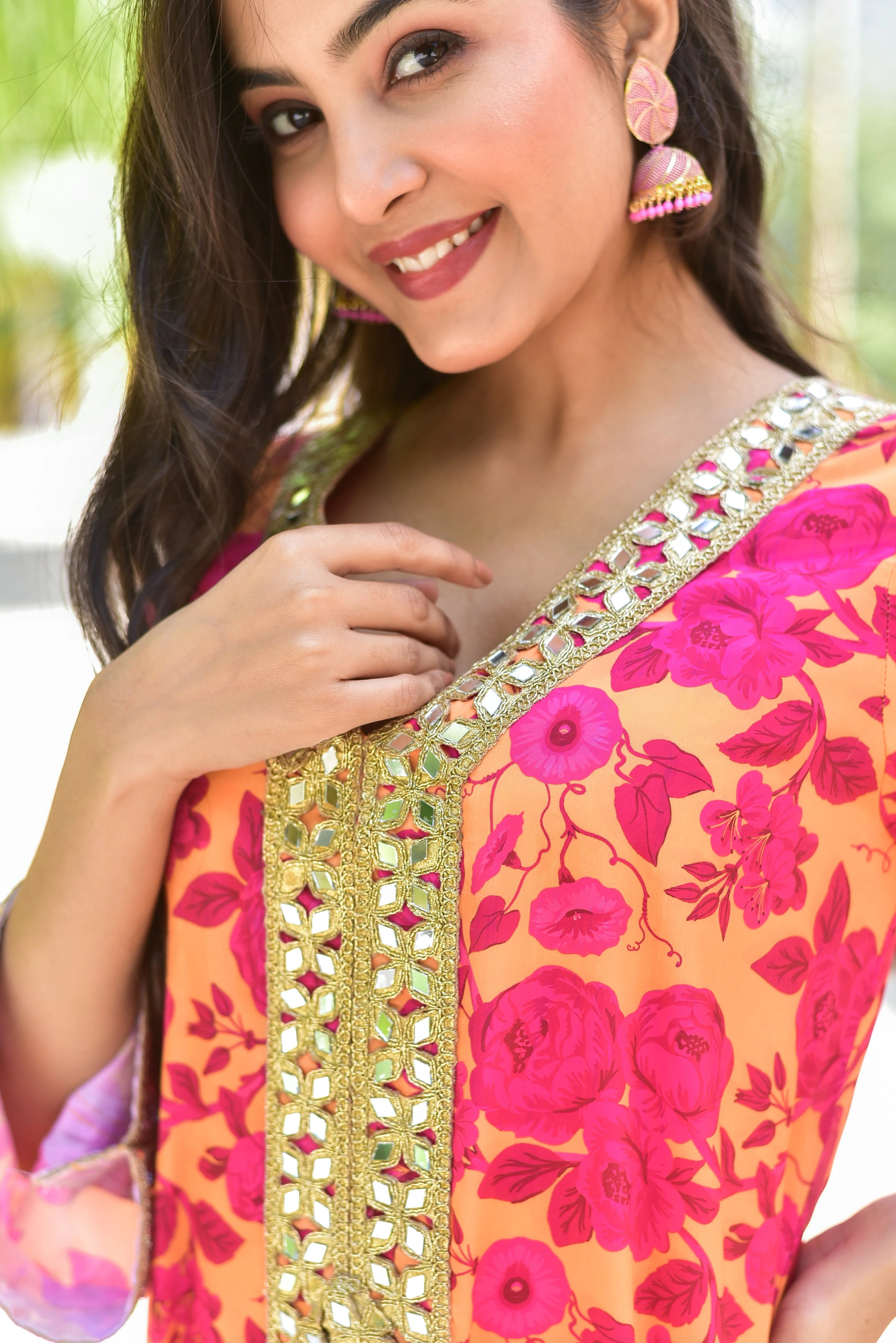 Elevate Your Style with the Gul Bahar Afghani Dress

The Gul Bahar Afghani Dress is a stunning piece of clothing that combines vibrant floral patterns with a modern silhouette, creating a unique and eye-catching ensemble perfect for any occasion.

Key Features:

 Digital Print: The dress features an exquisite digital print that showcases a beautiful floral pattern in shades of pink and yellow, adding a touch of elegance and sophistication to the overall design.