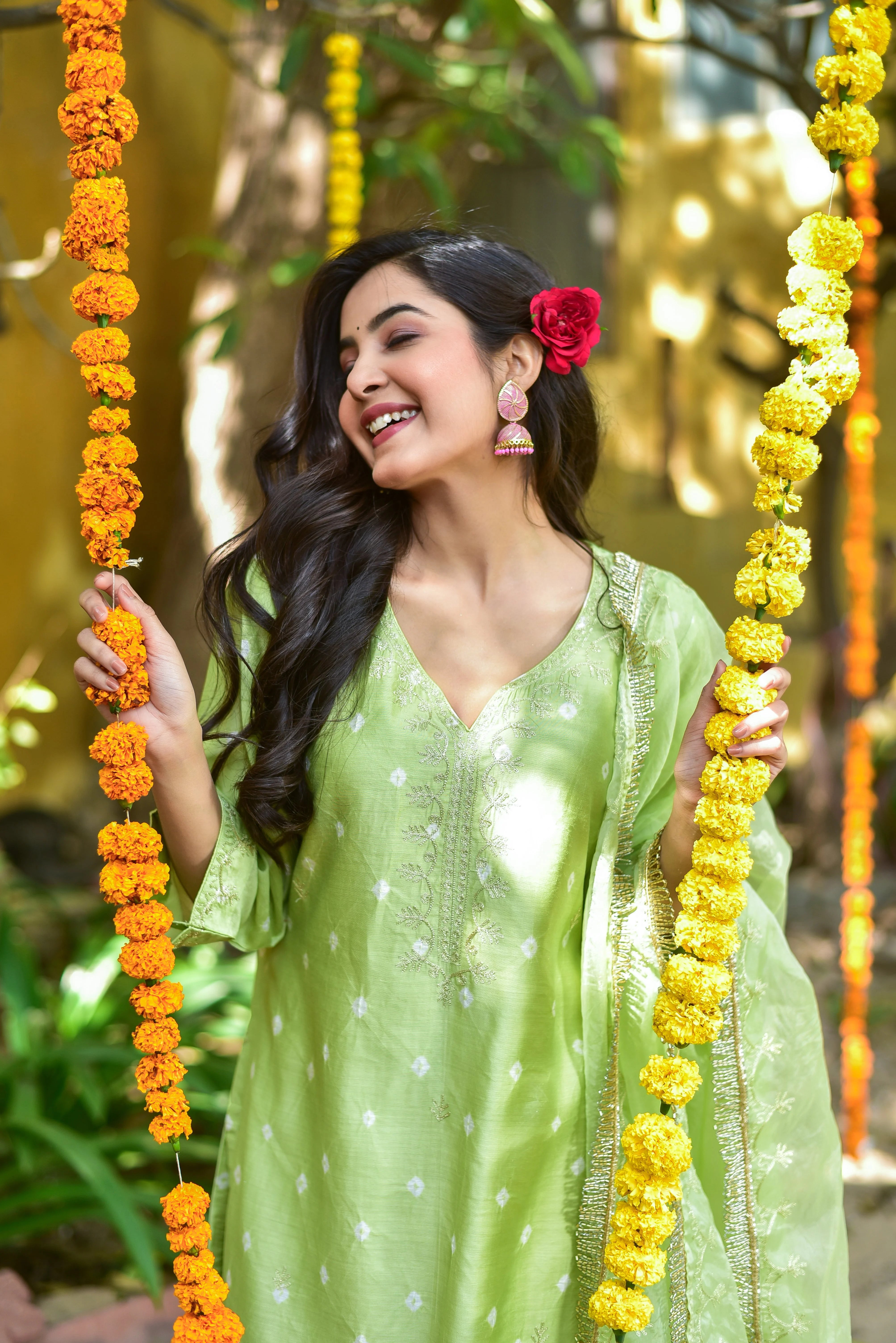 The Green Bandhej A-Line Kurta Set is a stunning ensemble that embodies the essence of traditional Indian craftsmanship with a modern twist. The vibrant mint-green hue of the kurta set is adorned with intricate bandhej tie-dye patterns, adding a touch of elegance and sophistication to any occasion.

Crafted from luxurious silk fabric, this kurta set exudes quality and comfort. The A-line silhouette flatters the figure, creating a feminine and feminine look.