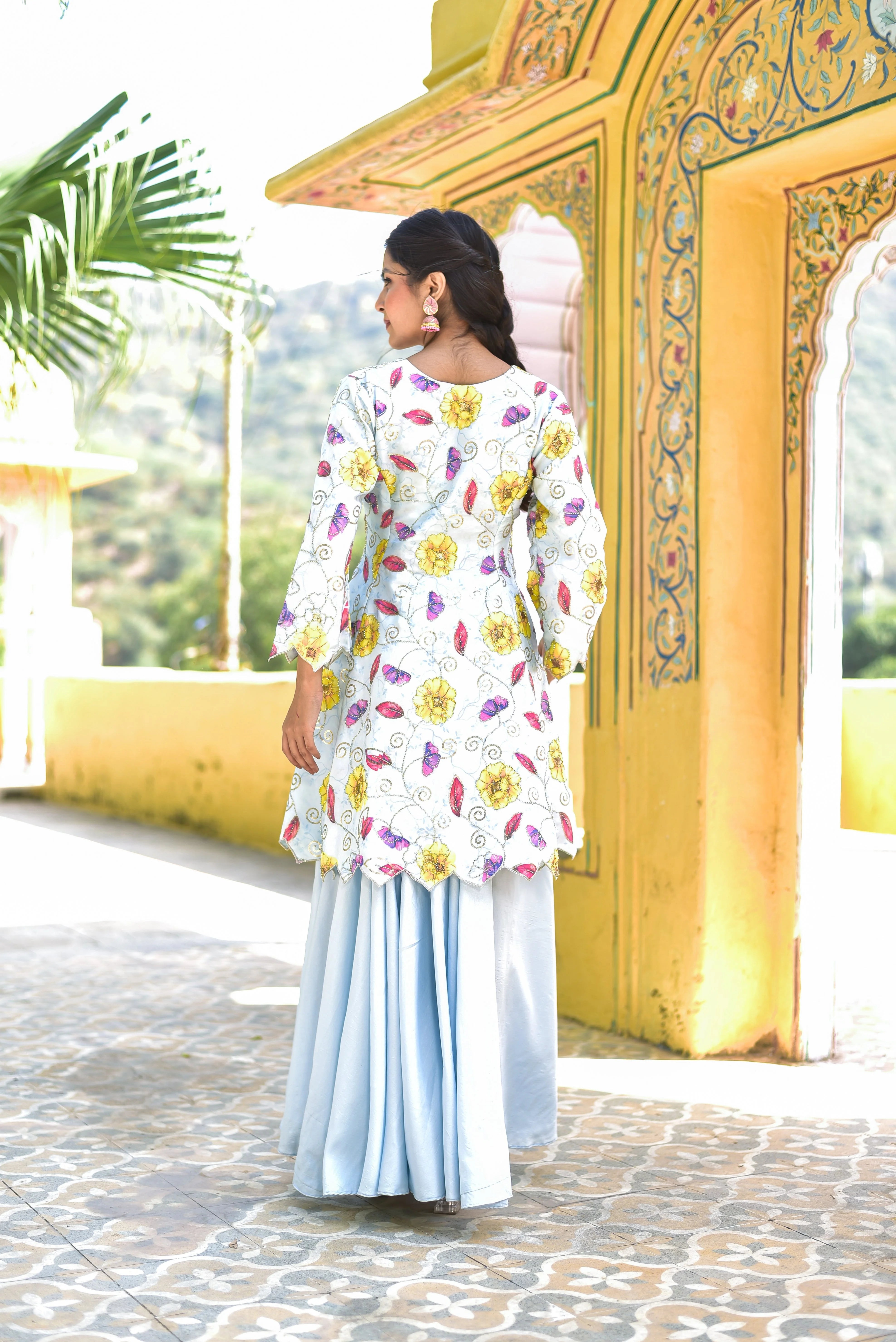 The Blue Morning Mist Floral Kurta Set is a stunning ensemble that embodies the essence of elegance and sophistication. This exquisite outfit features a beautiful floral pattern in soft blues and whites, reminiscent of a misty morning garden. The intricate design is crafted with attention to detail, making it a true masterpiece of contemporary fashion.