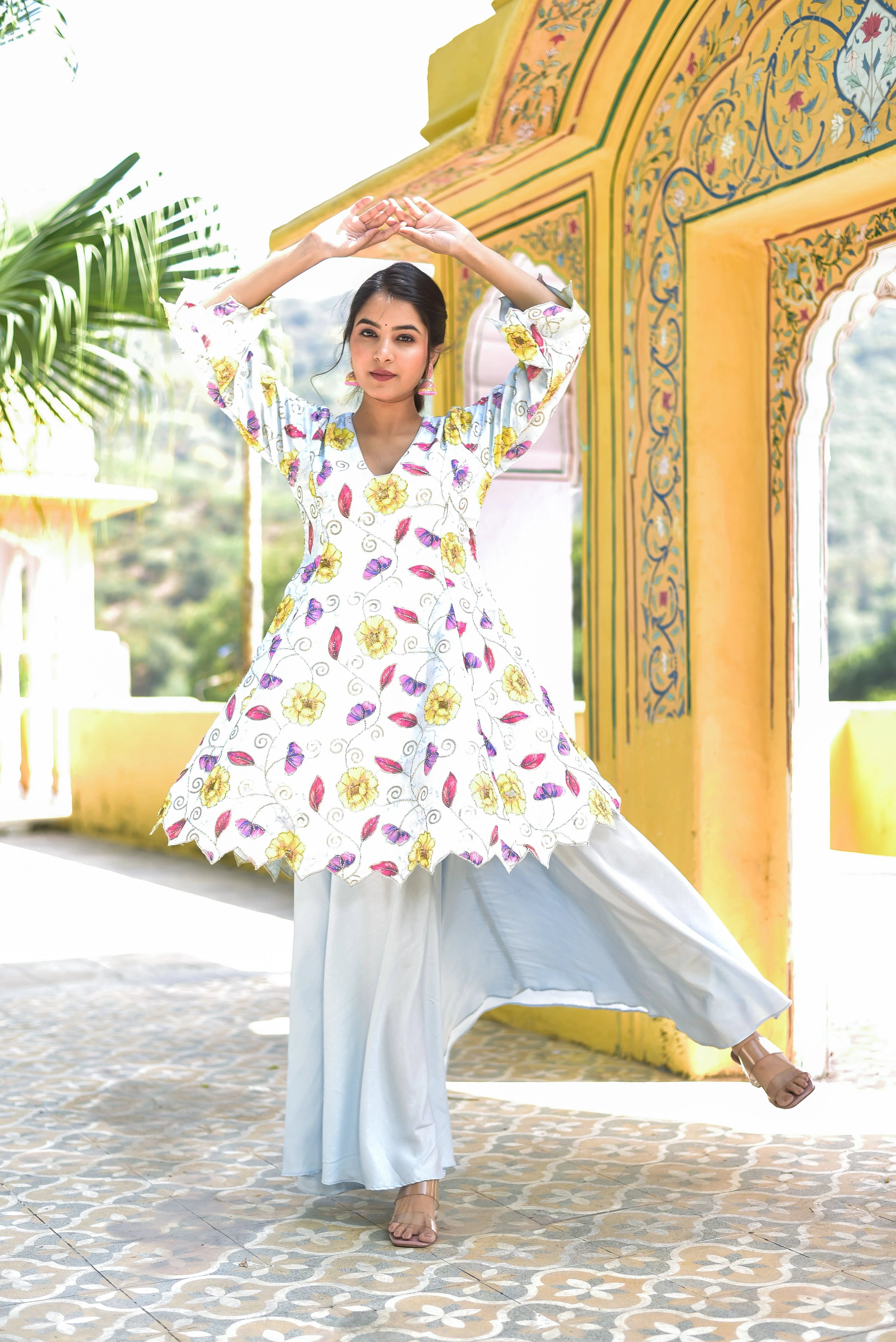 The Blue Morning Mist Floral Kurta Set is a captivating ensemble that embodies the essence of a serene morning garden. The soft blue and white hues of the kurta set evoke a sense of calmness, while the intricate floral print adds a touch of elegance. The set features a V-neckline and 3/4 sleeves, creating a flattering silhouette that is both comfortable and stylish. Crafted from high-quality fabric, this kurta set is perfect for any occasion, from casual gatherings to special events.