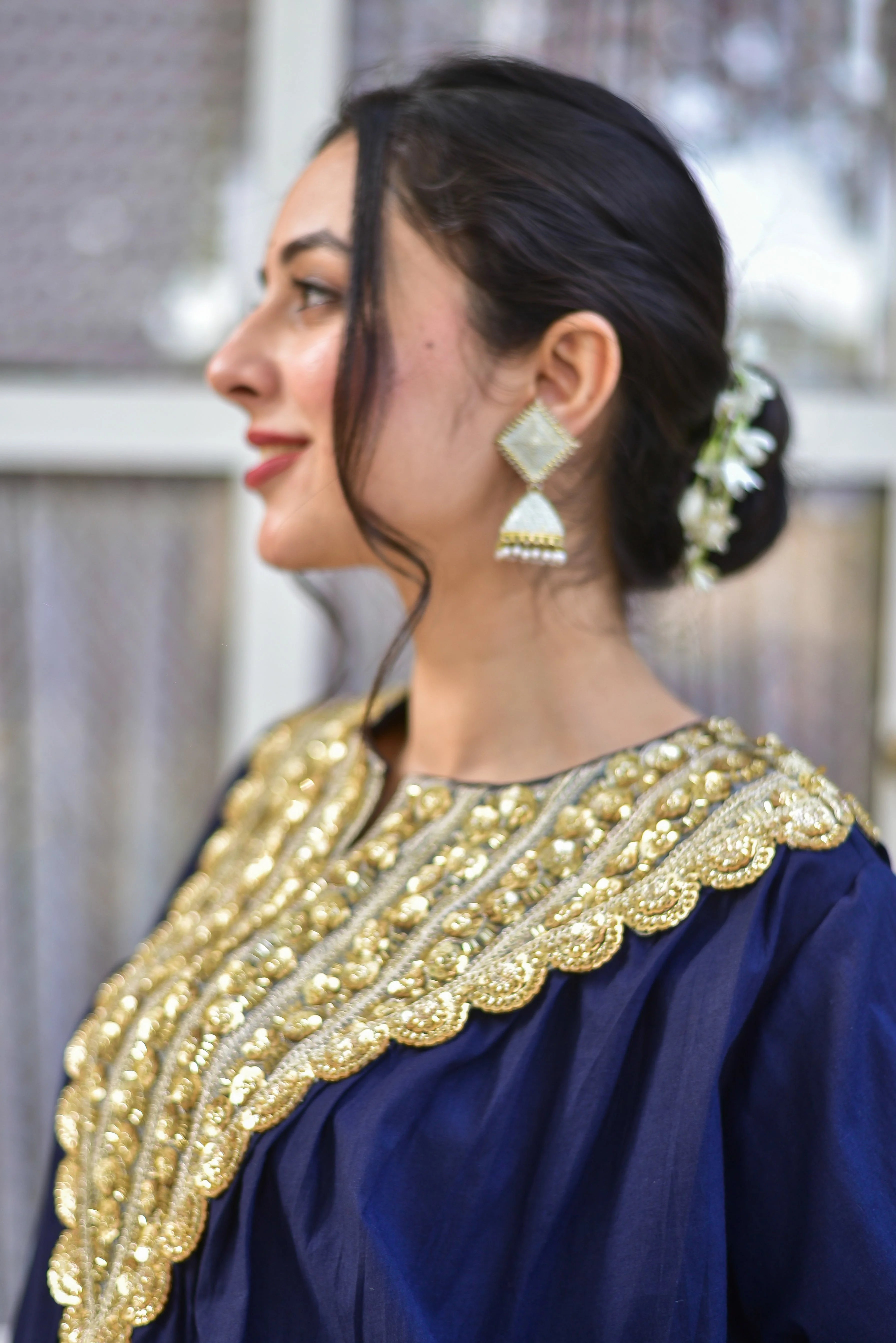 The Blueberry Gold Glaze Co-Ord Set is a stunning ensemble that exudes effortless elegance and sophistication. Crafted from 100% pure cotton, this luxurious set boasts a rich blue hue and intricate gold glaze detailing, creating a beautiful contrast that adds depth and visual interest to the overall design.

The set features a classic co-ord style, with a matching top and bottom that are designed to be worn together for a cohesive and stylish look.