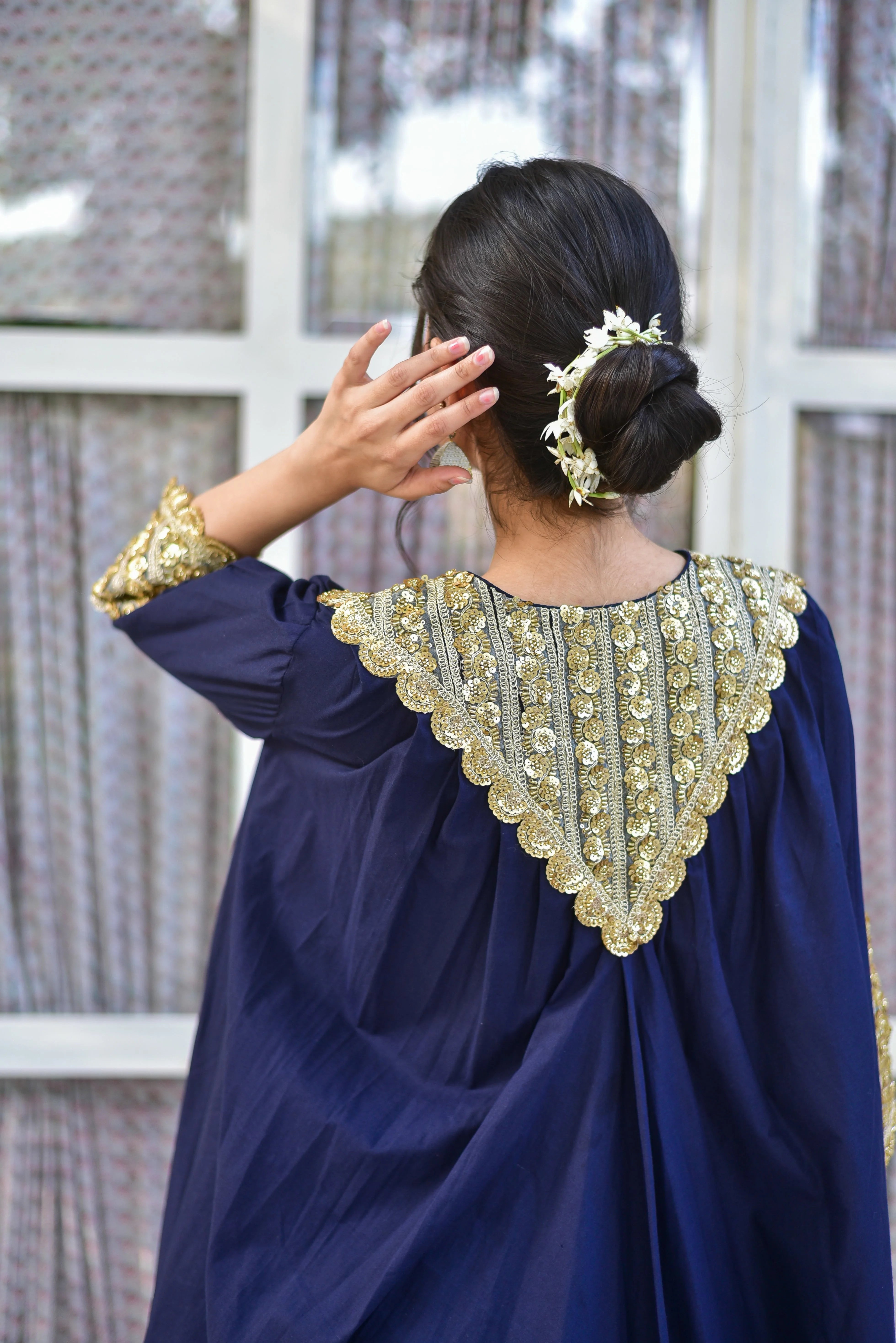 Experience Timeless Elegance with the Blueberry Gold Glaze Co-Ord Set

The Blueberry Gold Glaze Co-Ord Set is a masterful blend of contemporary design and traditional craftsmanship, presented in a stunning ensemble that exudes effortless elegance. Crafted from 100% pure cotton, this luxurious set boasts a rich blue hue and intricate gold embellishments that create a breathtaking visual effect.

Key Features:

 Luxurious Fabric: Made from 100% pure cotton, ensuring all-day comfort and breathability.