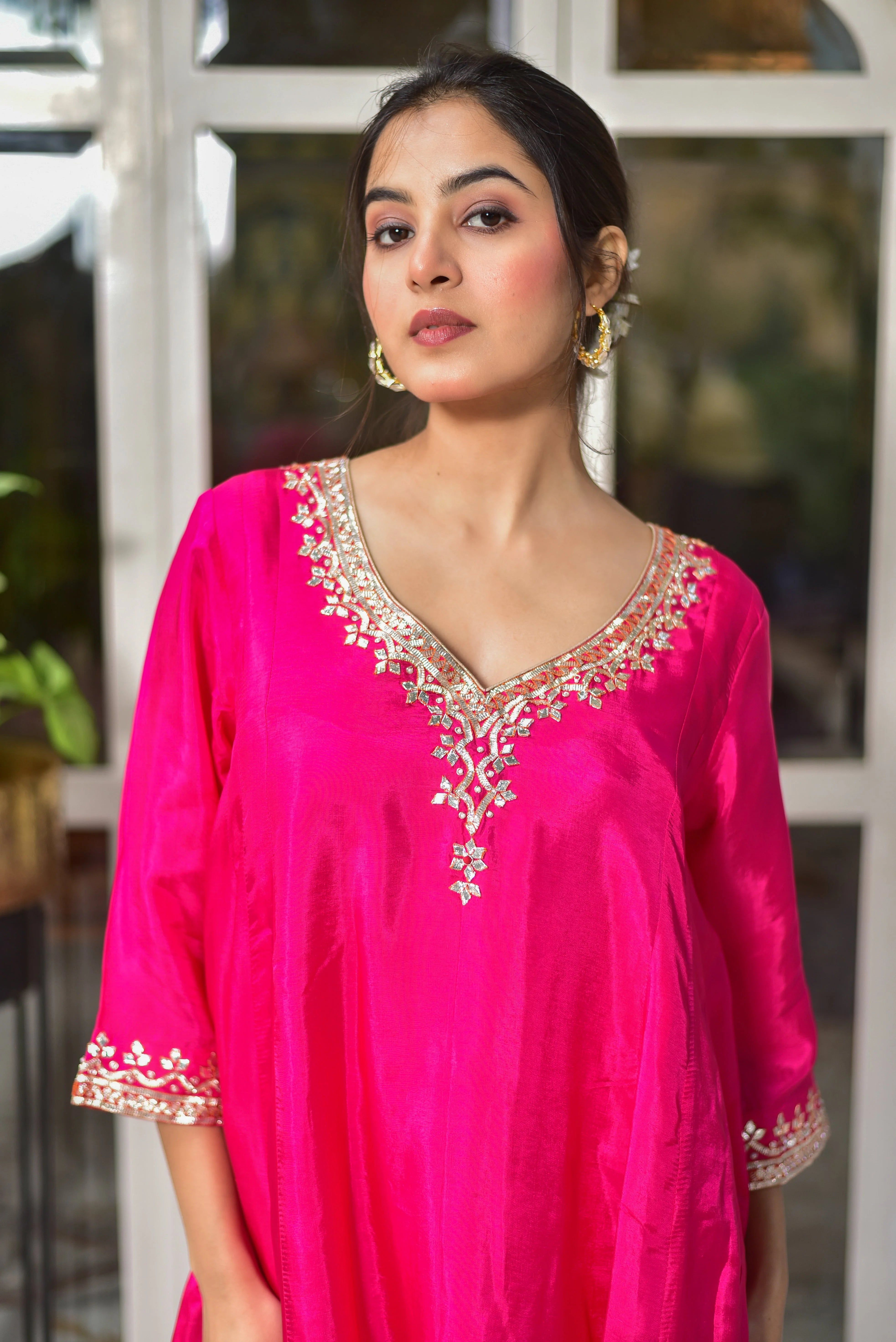 The Rani Pink Punjabi Style Kurta & Dhoti Set is a stunning example of traditional Indian attire, exuding elegance and sophistication. Crafted from luxurious silk, this ensemble boasts a rich, vibrant pink hue that commands attention. The intricate embroidery on the kurta adds a touch of opulence, while the dhoti pants provide a comfortable and stylish base layer.

This set is perfect for special occasions, such as weddings or festivals, where you want to make a statement.