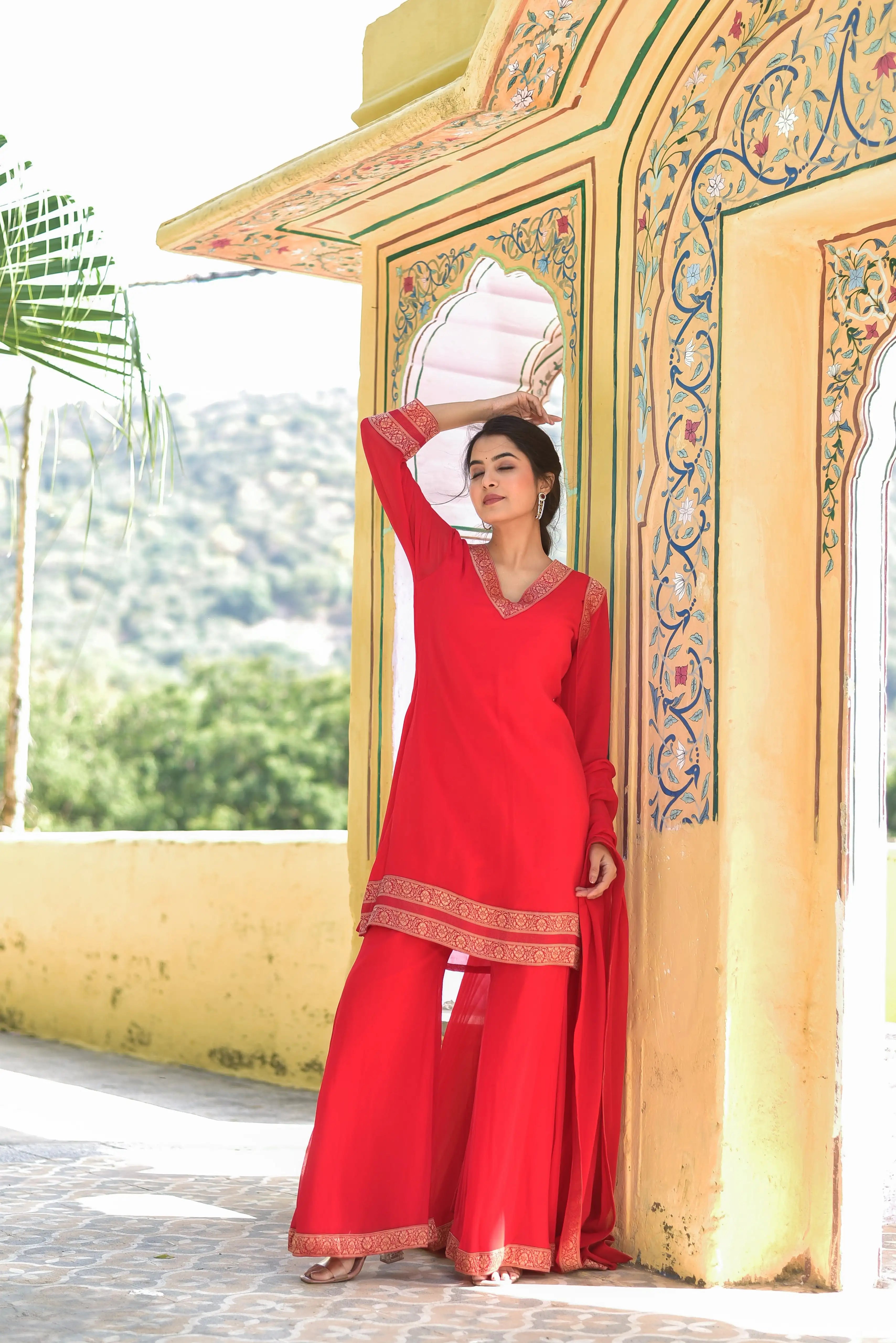 Classic Red Brocade Kurta Set: Timeless Elegance and Royal Sophistication

This exquisite Classic Red Brocade Kurta Set embodies traditional craftsmanship and regal elegance, making it a perfect addition to your festive wardrobe. The vibrant red hue symbolizes auspiciousness and joy, while the intricate brocade detailing adds a touch of royal grandeur.