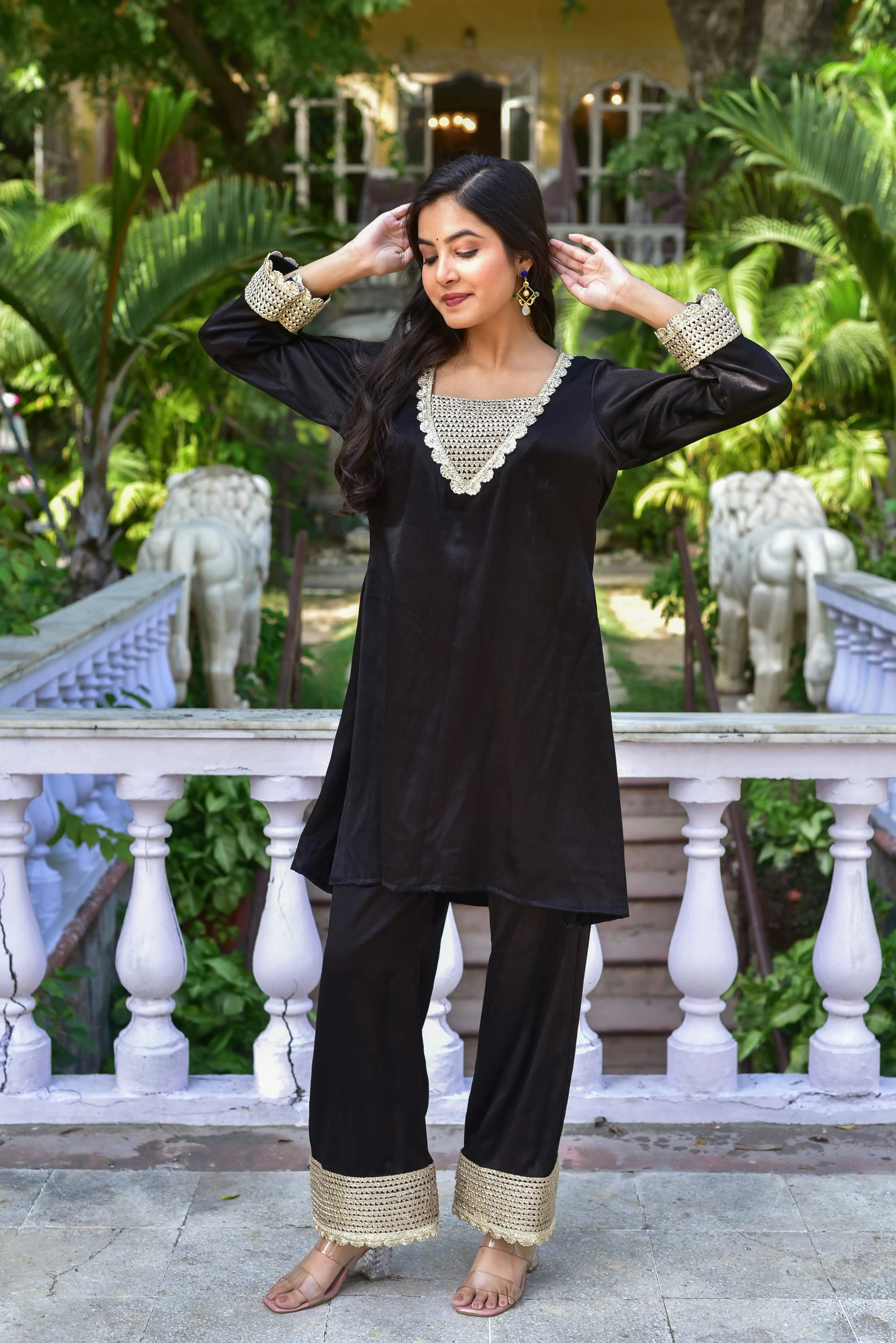 The Black Shadow Co-ord Set is a masterful blend of classic elegance and contemporary style, presented in a sophisticated monochrome palette. Crafted from luxurious black fabric, this ensemble features a timeless design that exudes understated luxury. The clean lines and minimalist silhouette are accentuated by intricate detailing, creating a striking visual effect.