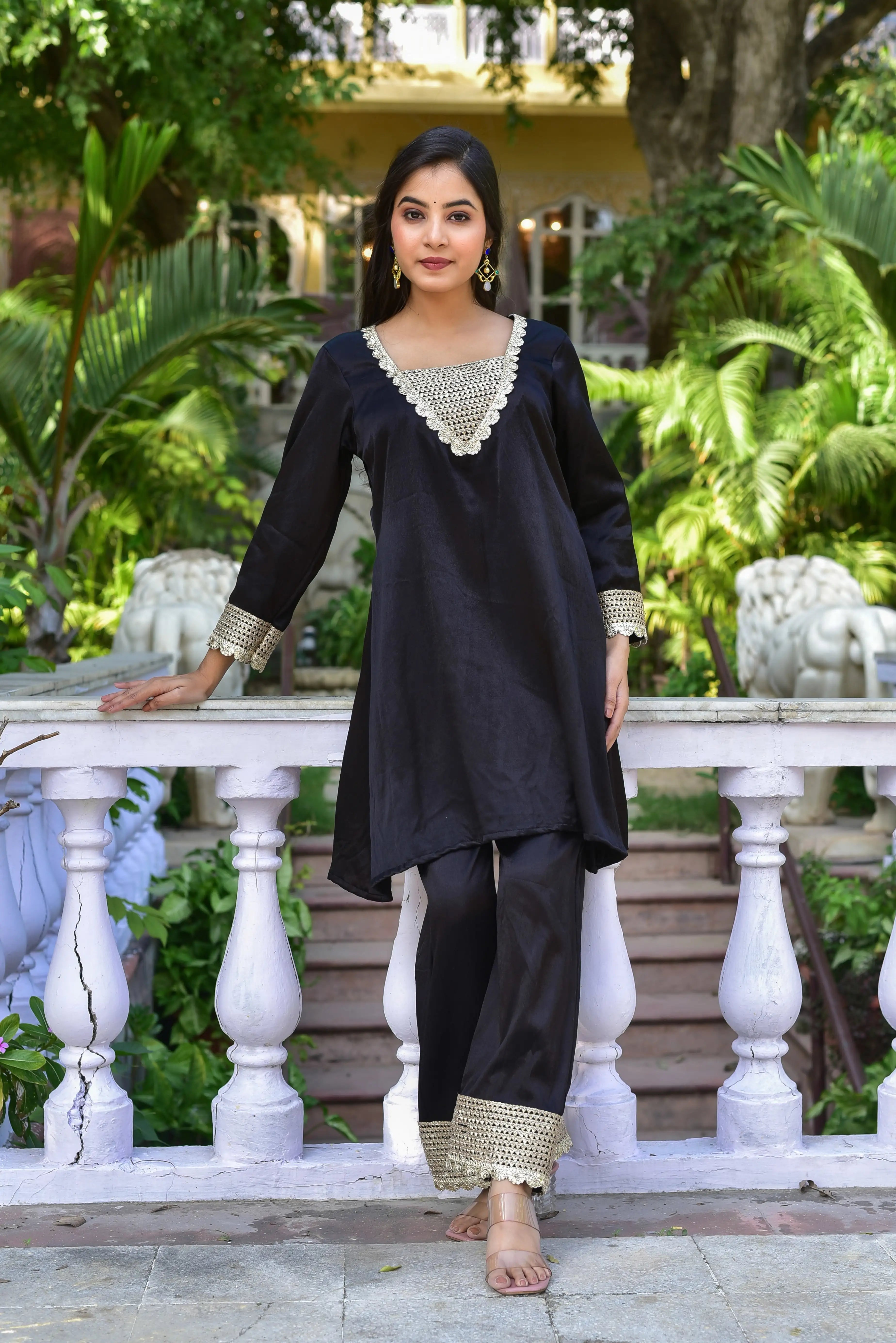 The Black Shadow Co-ord Set is a masterclass in understated elegance, where classic silhouettes meet contemporary detailing. Crafted from rich black fabric, this ensemble exudes sophistication and timeless charm. The carefully selected fabric choice ensures both comfort and style, making it a versatile addition to any wardrobe.