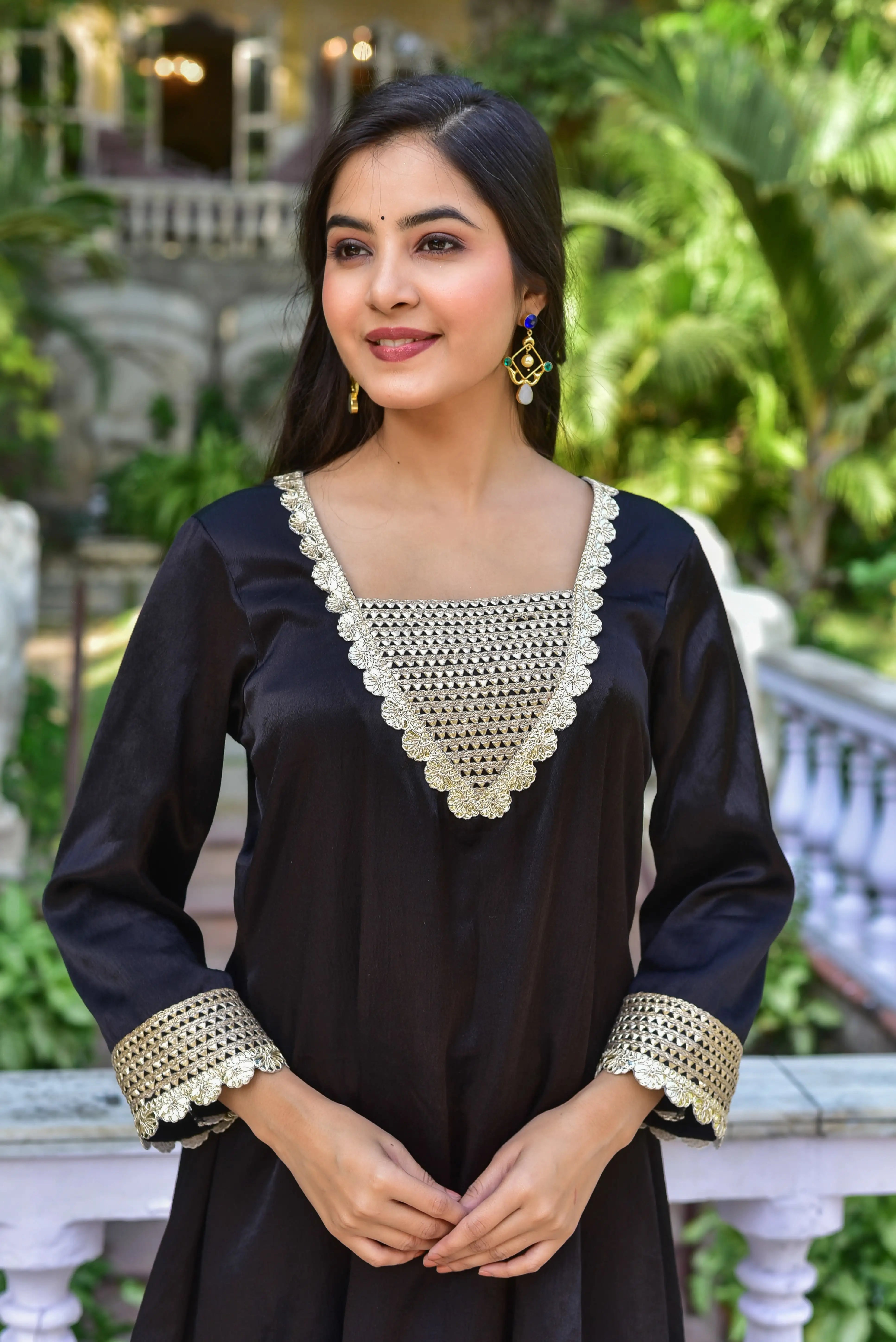 The Black Shadow Co-ord Set - Timeless Elegance in Monochrome Perfection

Experience understated luxury with this sophisticated co-ord ensemble, blending classic silhouettes with contemporary detailing. The rich black fabric creates a striking canvas for the elegant design, featuring a V-neck top with intricate lace trim and a matching straight-leg pant. Perfect for any occasion, this set exudes timeless style and sophistication. Elevate your wardrobe with this must-have piece.