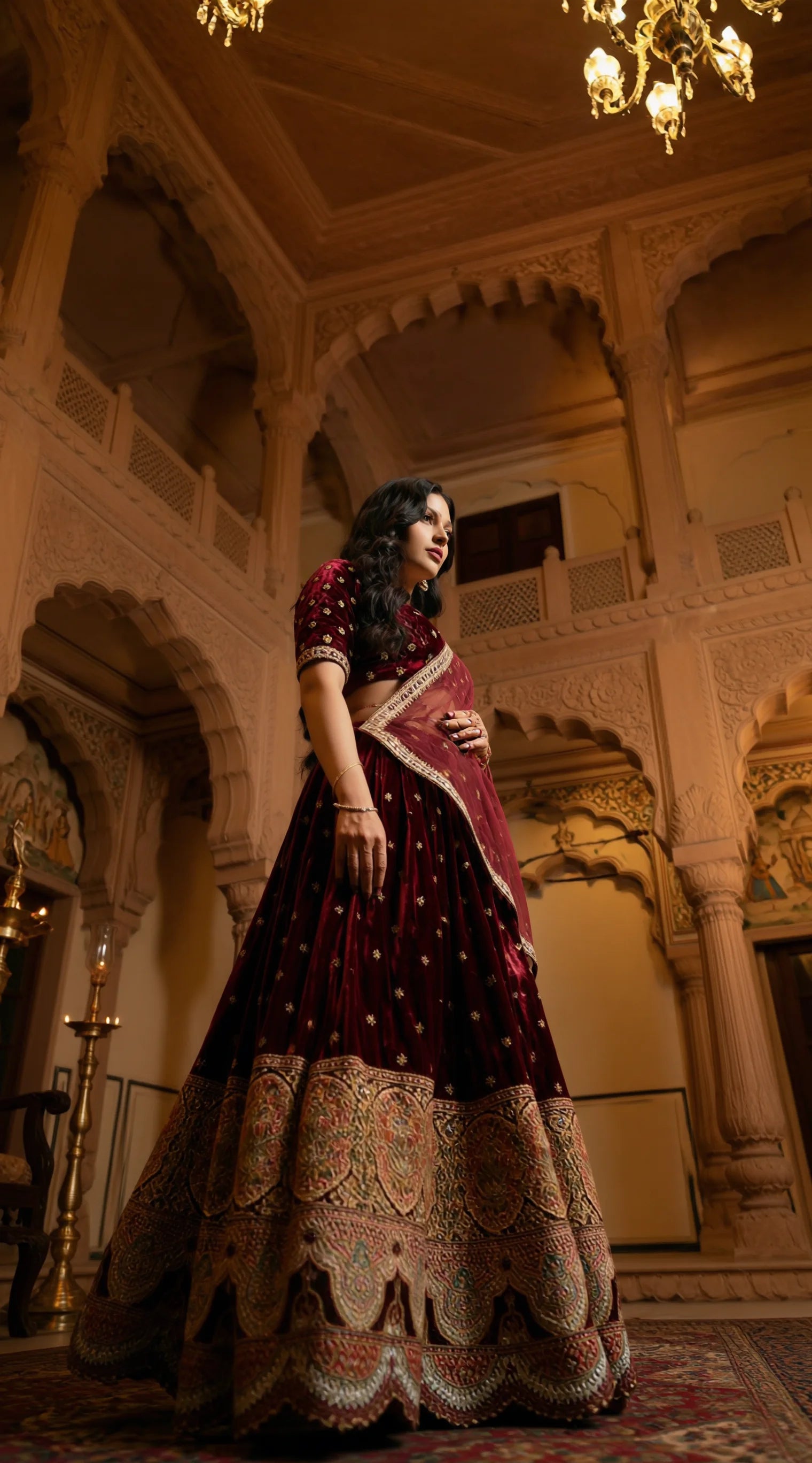 Saroj Jain maroon Velvet Lehenga Set, traditional Indian occasion wear with gold accents.