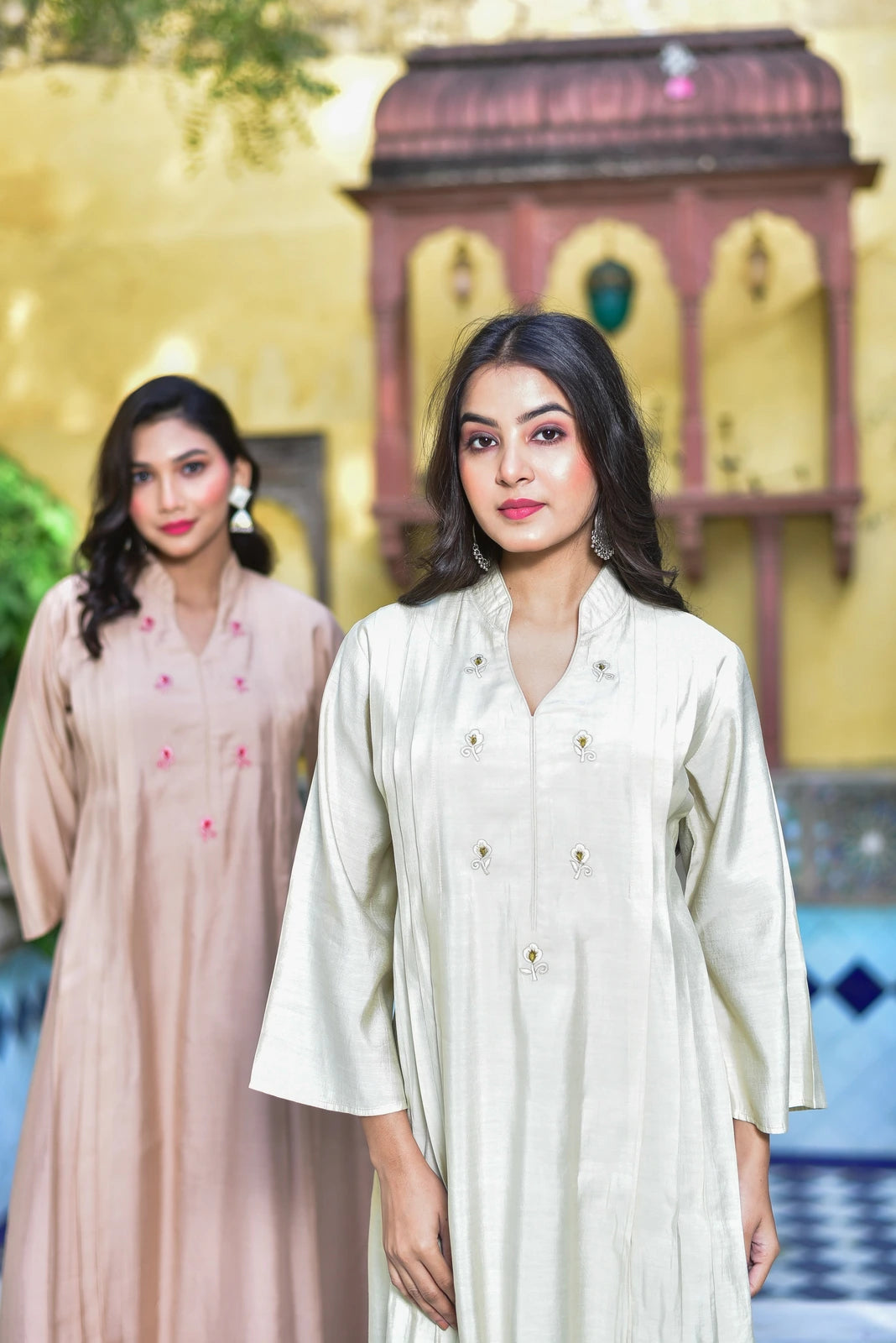 The Royal Rasmalai Pleated Kurta Set is a stunning 2-piece ensemble that exudes traditional charm and elegance. This exquisite set features a kurta with intricate pleats, adding a touch of sophistication to the overall design. Crafted from high-quality fabric, the kurta ensures both comfort and durability. The set's elegant design makes it perfect for special occasions or everyday wear, allowing you to make a statement with your fashion choices.