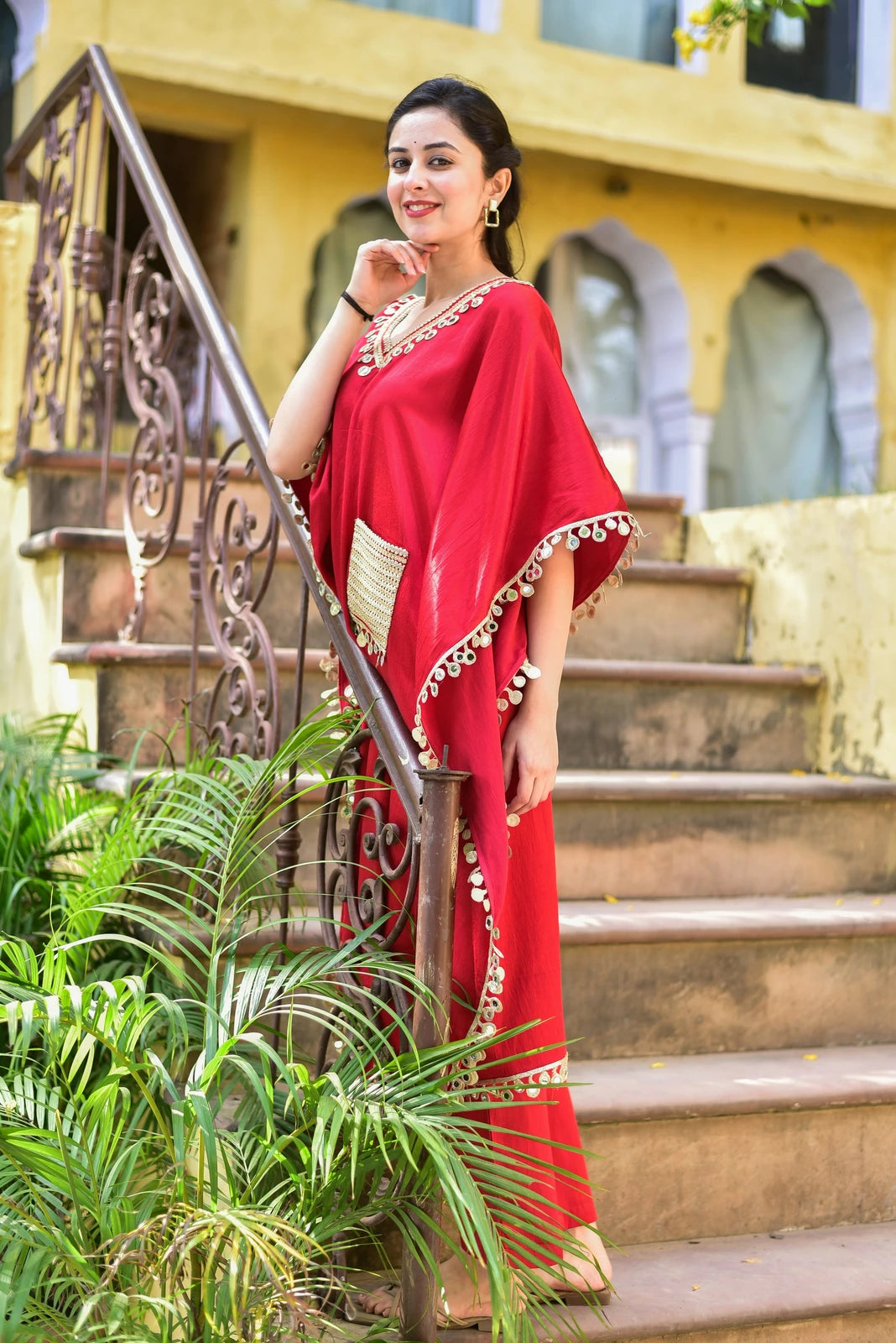 The Chili Glaze Mirror Work Set is a stunning ensemble that exudes elegance and sophistication. Crafted from luxurious Gazzi Satin, this set features a kaftan with intricate mirror work detailing that adds a touch of glamour to any occasion. The rich, vibrant red hue of the kaftan is complemented by the subtle shine of the mirrors, creating a truly eye-catching look. The set's design is both stylish and comfortable, making it perfect for formal events or everyday wear.