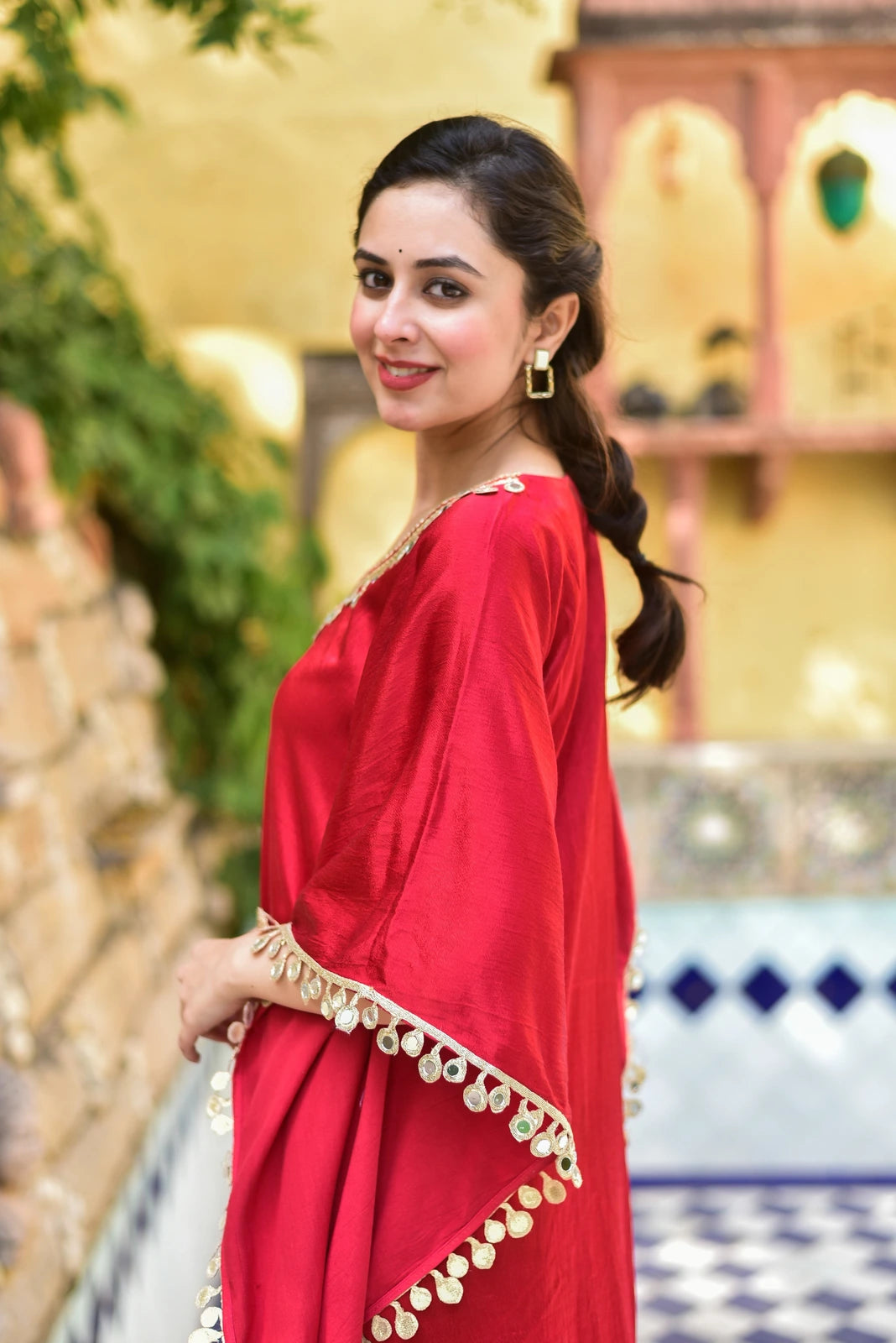 Exquisite Chili Glaze Mirror Work Kaftan Set

This stunning kaftan set exudes elegance and sophistication, crafted from luxurious Gazzi Satin fabric. The rich, emerald-inspired color palette is accentuated by intricate mirror work detailing that adds a touch of glamour to the overall design.