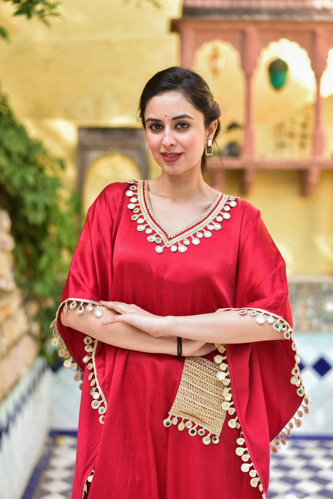 Elegant and Exquisite: A Closer Look at the Chili Glaze Mirror Work Set

The Chili Glaze Mirror Work Set is a stunning ensemble crafted from luxurious Gazzi Satin fabric. The rich emerald color of the set is complemented by intricate mirror work detailing that adds a touch of sophistication and elegance.