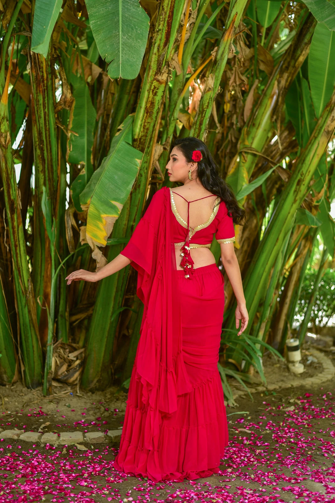 The Ruby Pink Georgette Sharara Set is a stunning fusion of traditional grace and contemporary design, perfect for weddings, festive celebrations, and special occasions. The ruby pink georgette fabric exudes elegance, while the sharara style adds a touch of modernity. This exquisite ensemble is sure to captivate and make a statement.