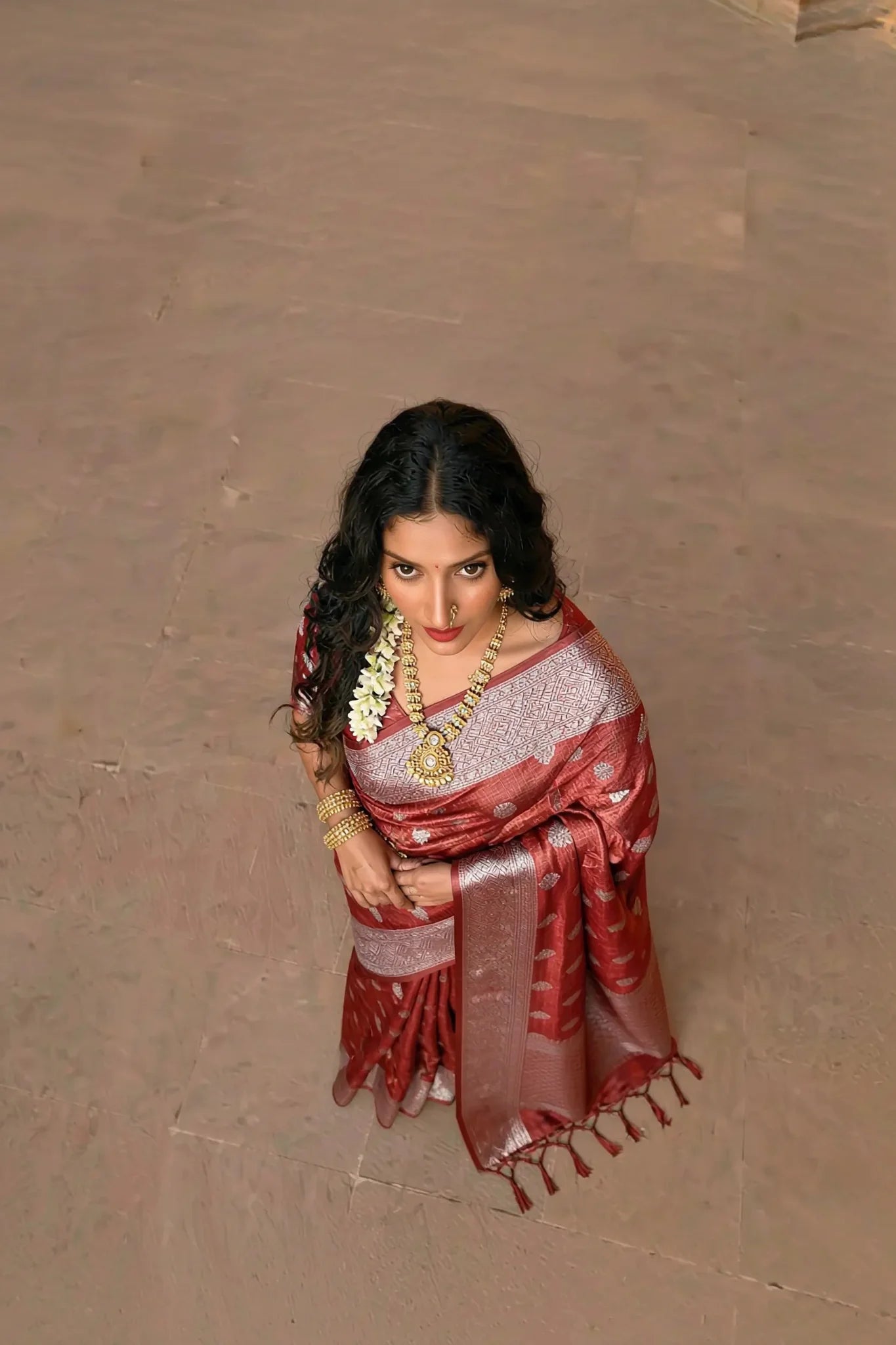 Elegant Crush Tissue Saree in Rust with Silver Zari