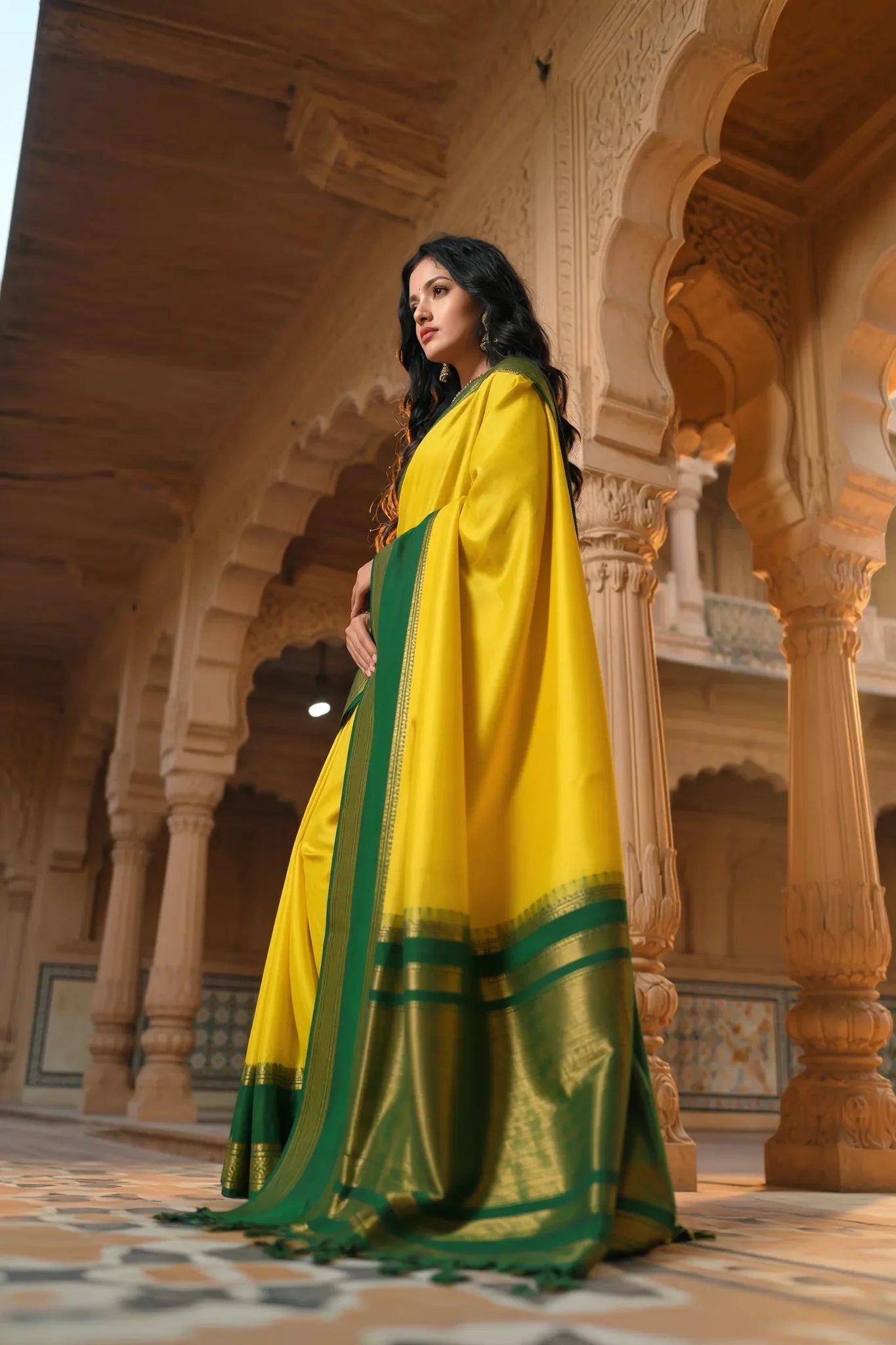 Elegant Crape Georgette Saree in Vibrant Yellow with Green Zari Border