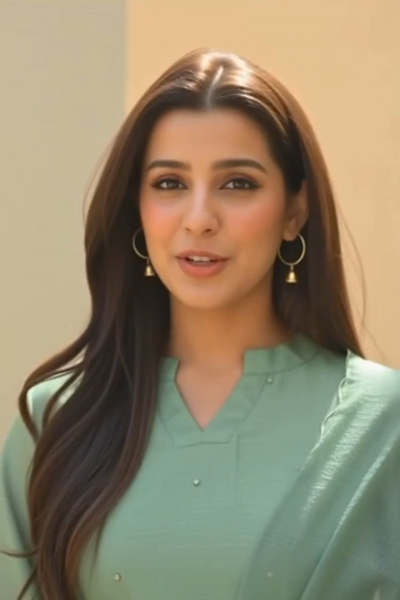 This fern green Mal Chanderi set features an A-line kurta with a slit neckline and full sleeves, adorned with delicate Mukesh work. It includes a comfortable cotton pant with a half-elastic waist and pull-up closure, paired with a graceful organza dupatta—perfect for festive and elegant occasions.