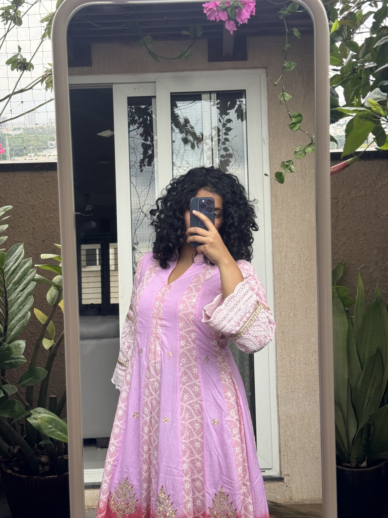 Saroj Jain Ombre Lavender Pink and Crimson Red Lucknowi Chikankari Anarkali Gown flare and hemline detail.