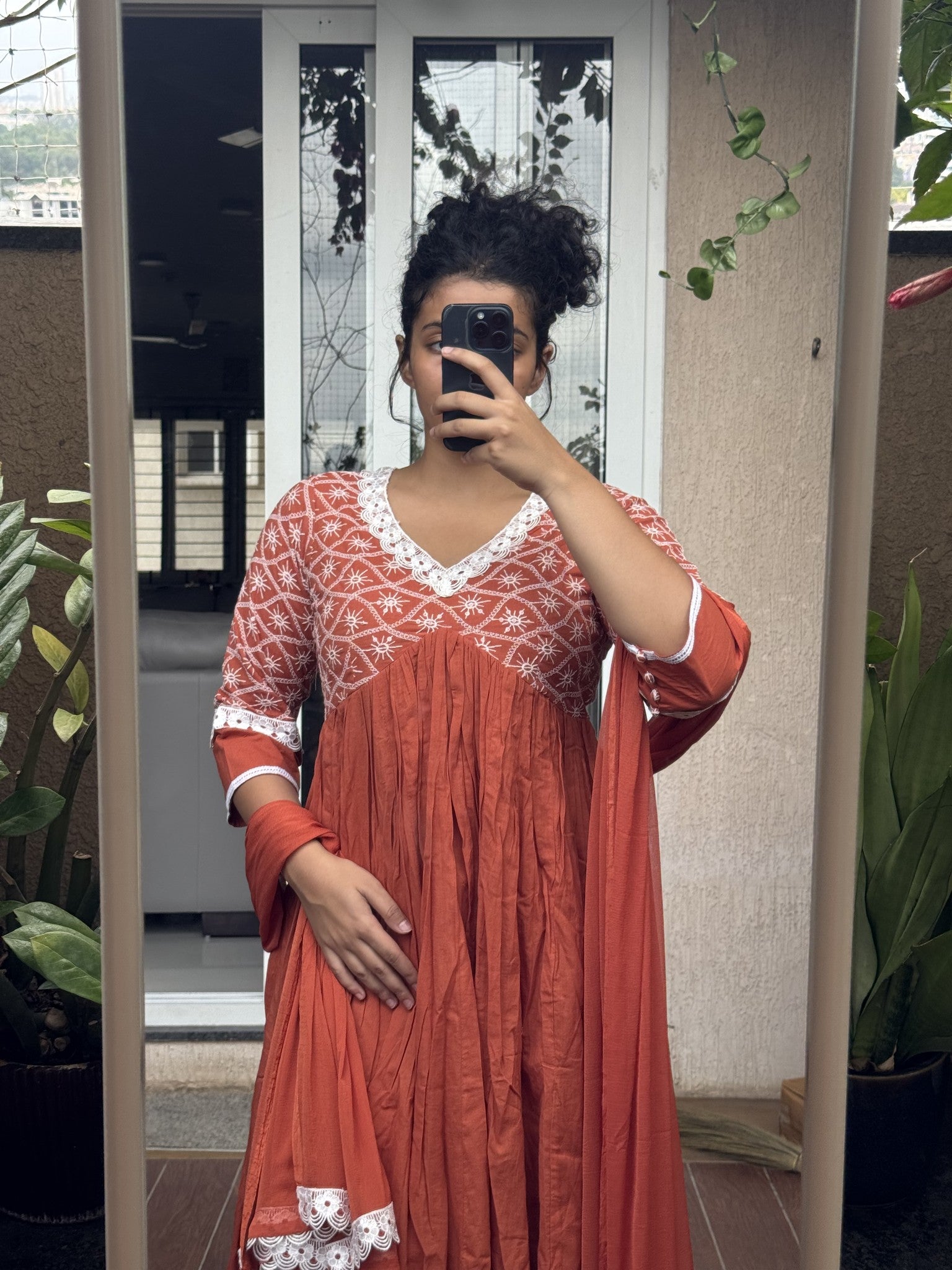 Saroj Jain Terracotta Rust Red Lucknowi Chikankari Anarkali Gown dupatta and sleeve lace trim.